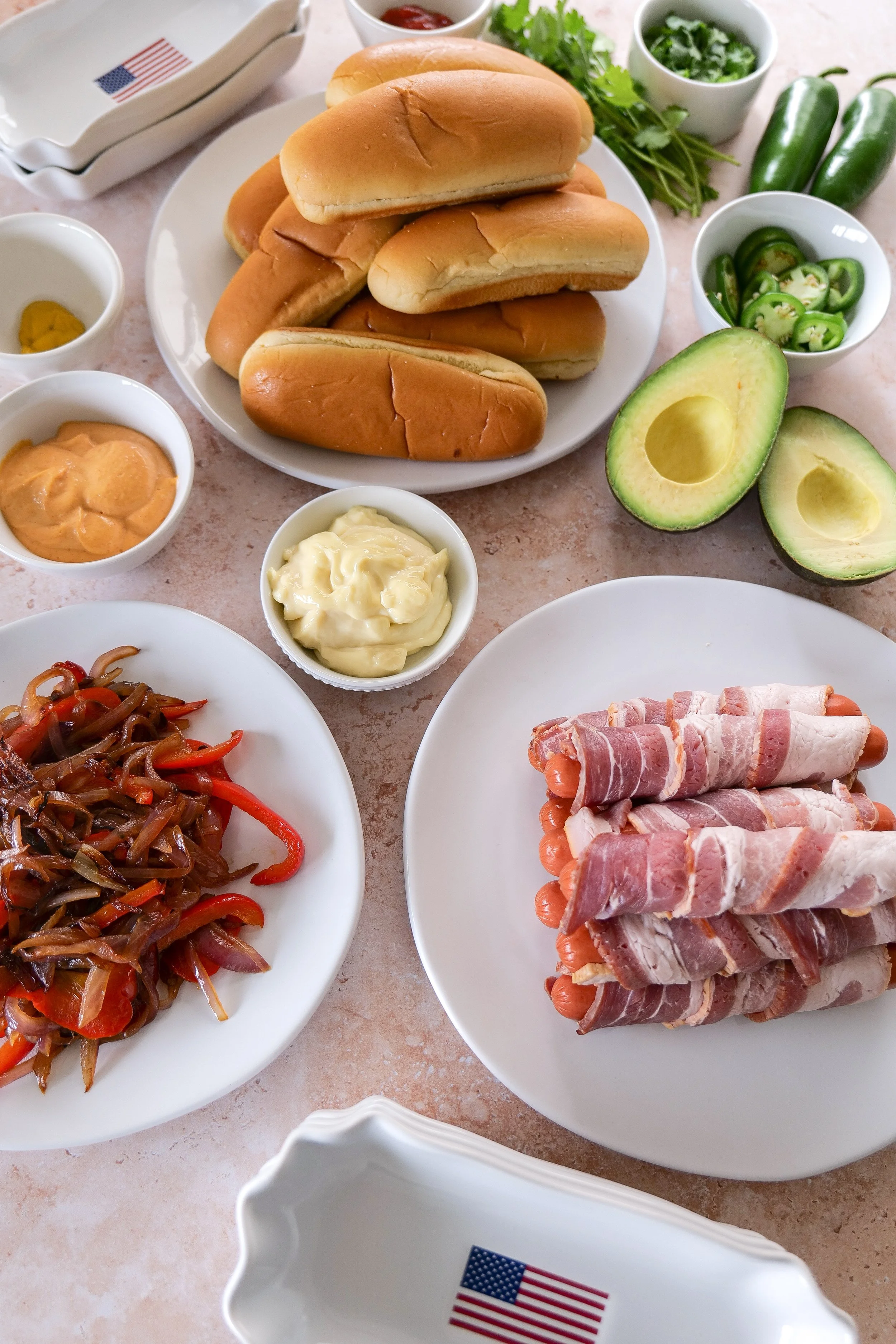 Patriotic entertaining table featuring bacon-wrapped hot dogs