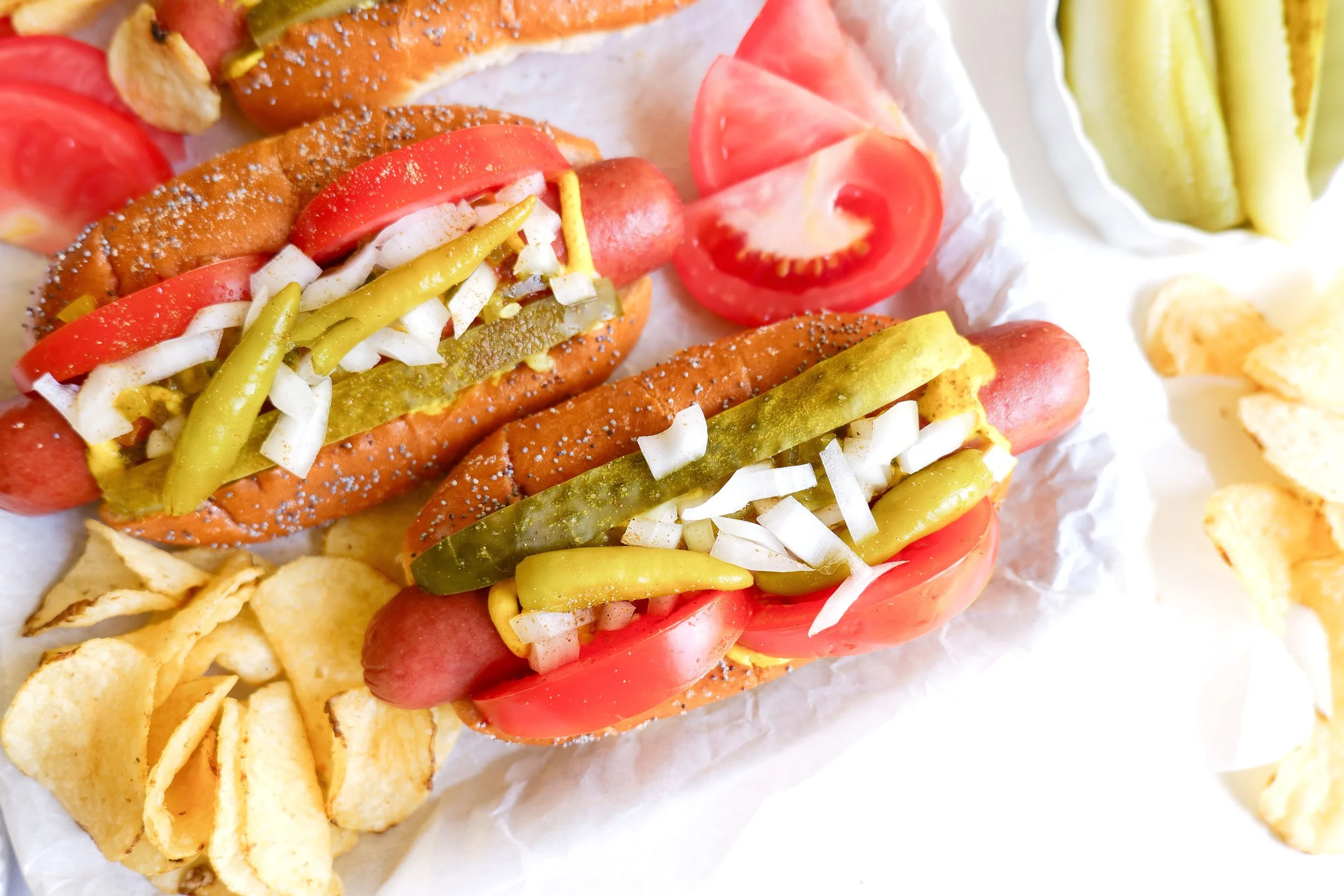 Authentic Chicago style hot dog loaded with classic toppings on a poppy seed bun.