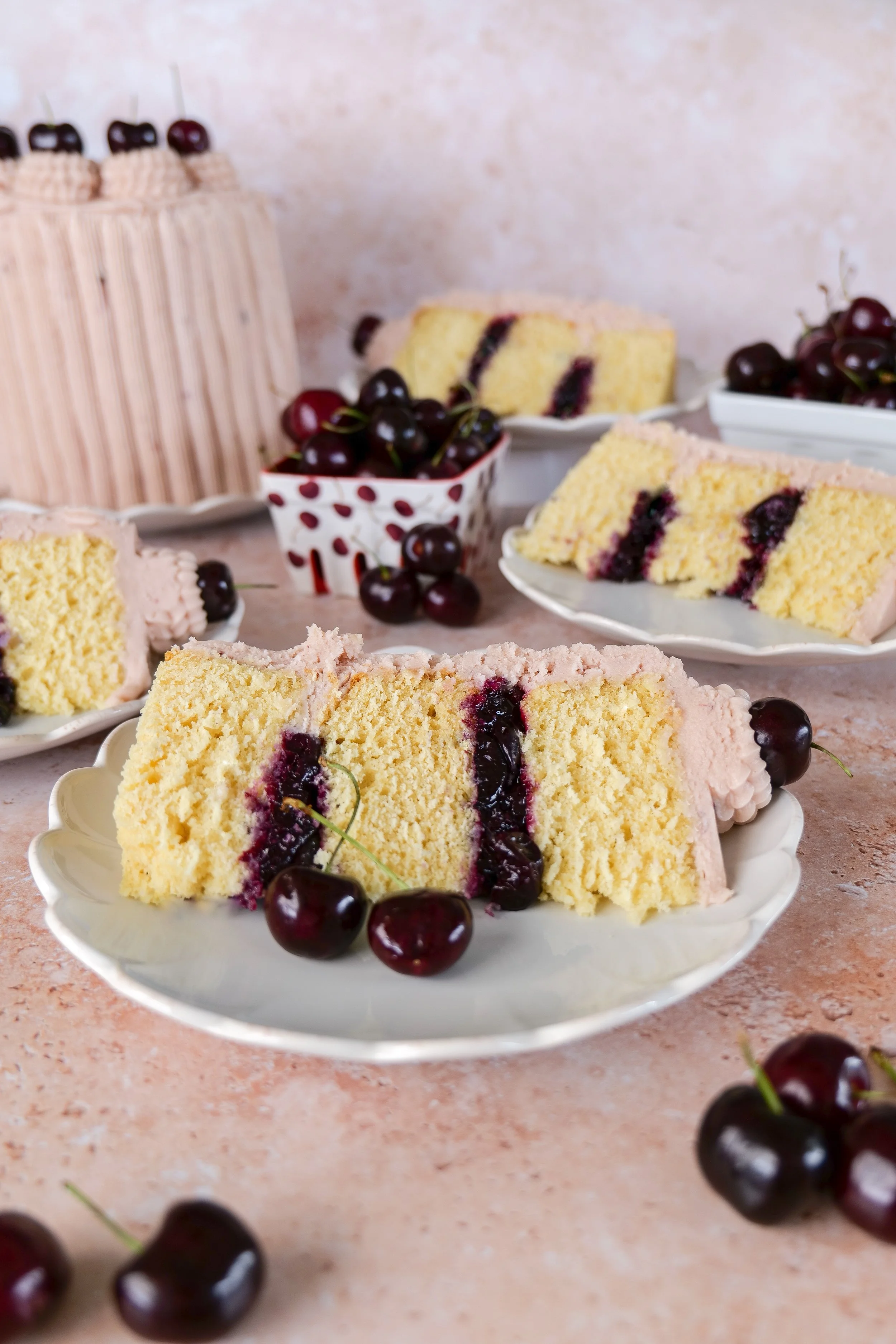 Fresh cherry cake recipe featuring vanilla bean cake layers and juicy cherry filling.