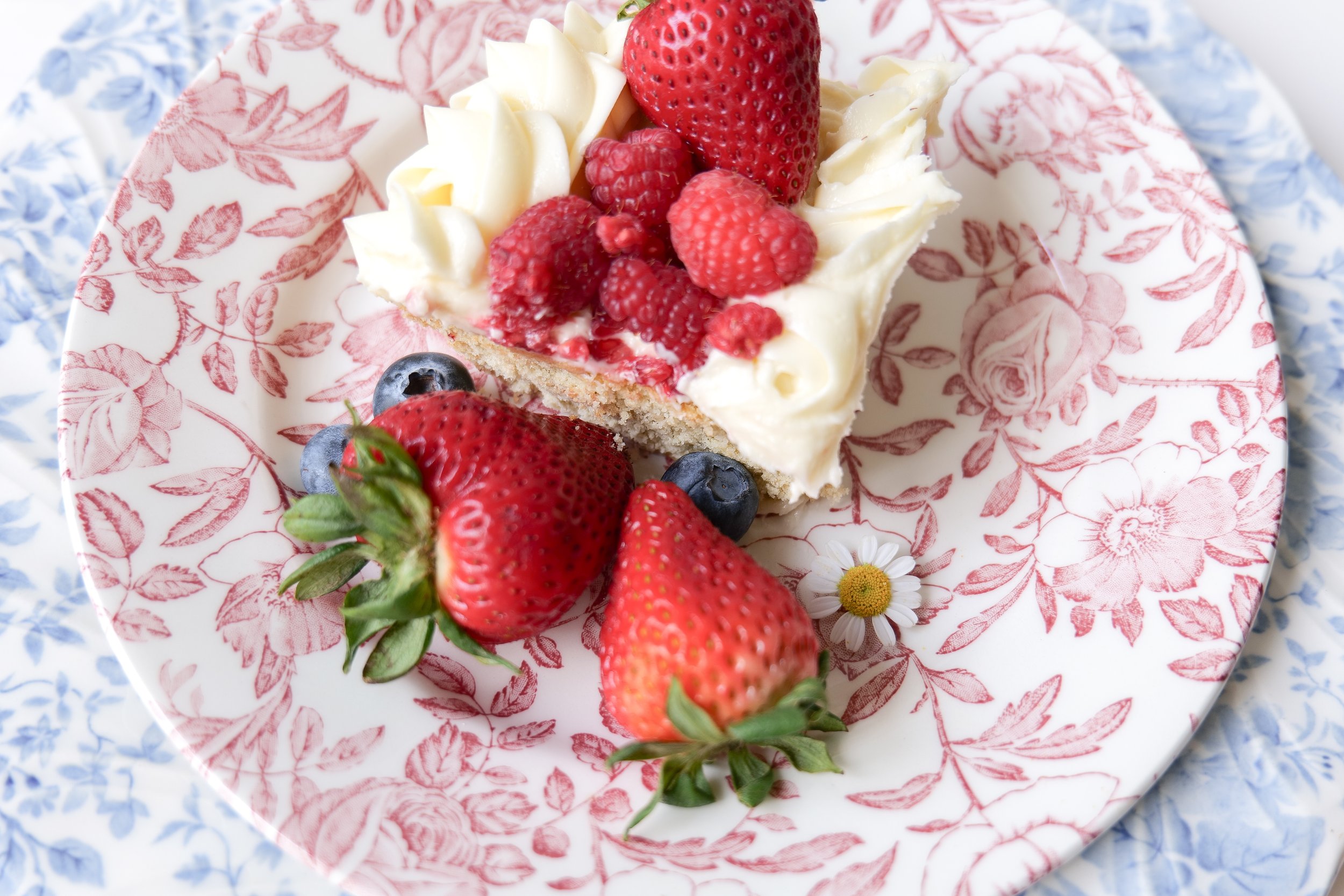 American flag fruit pizza with blueberries and strawberries on a sugar cookie crust