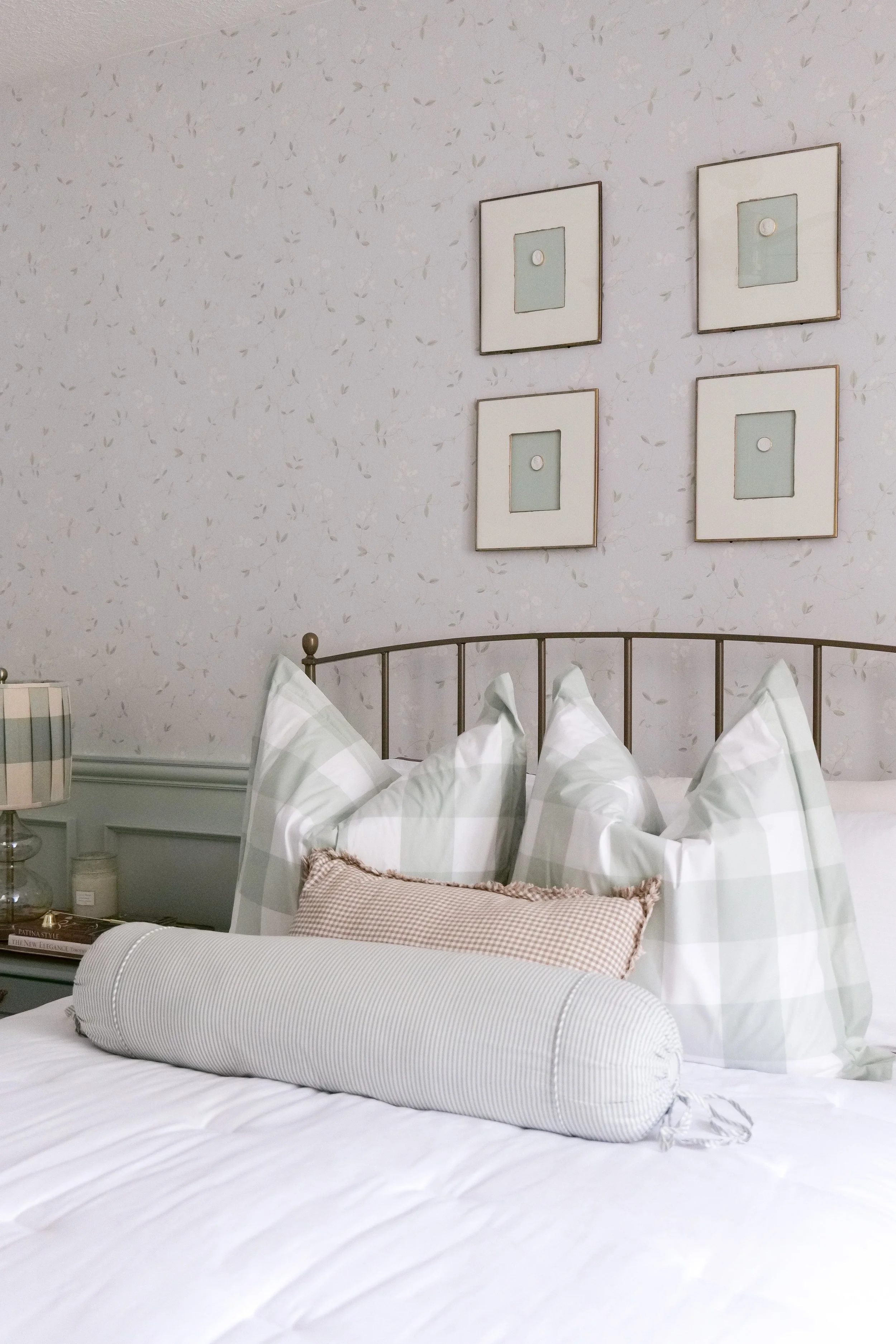 Soft blue wall color in traditional guest bedroom design with timeless decor styling.