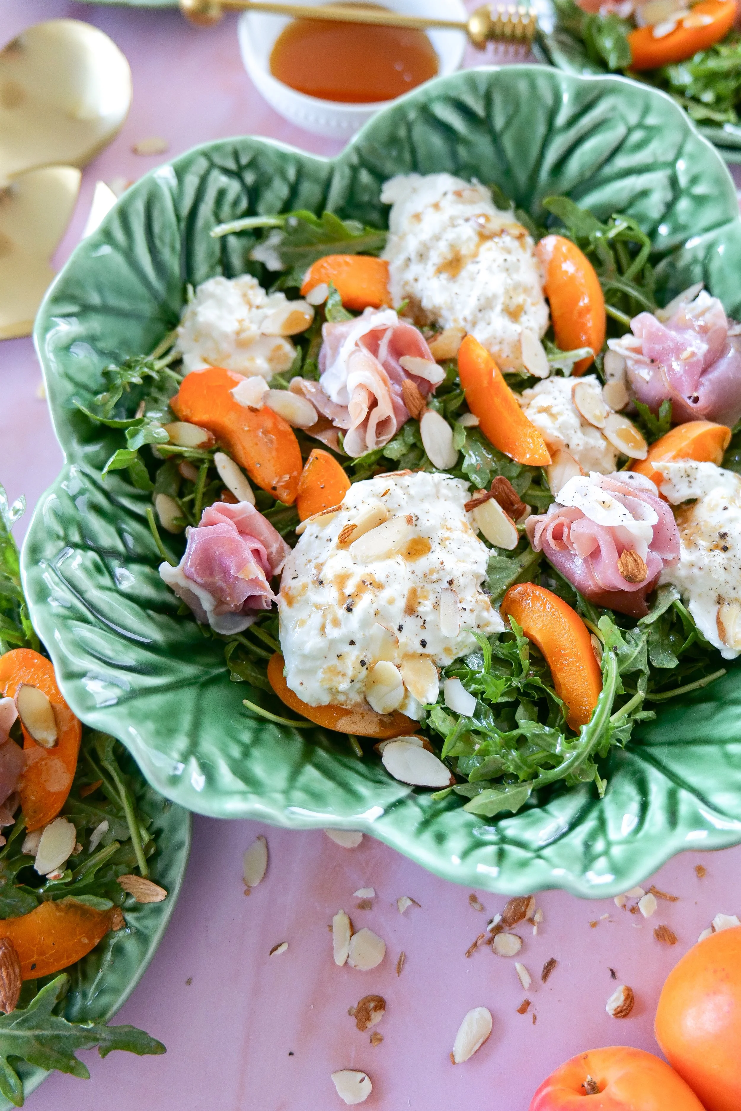 Elegant summer entertaining salad with apricots and burrata cheese.