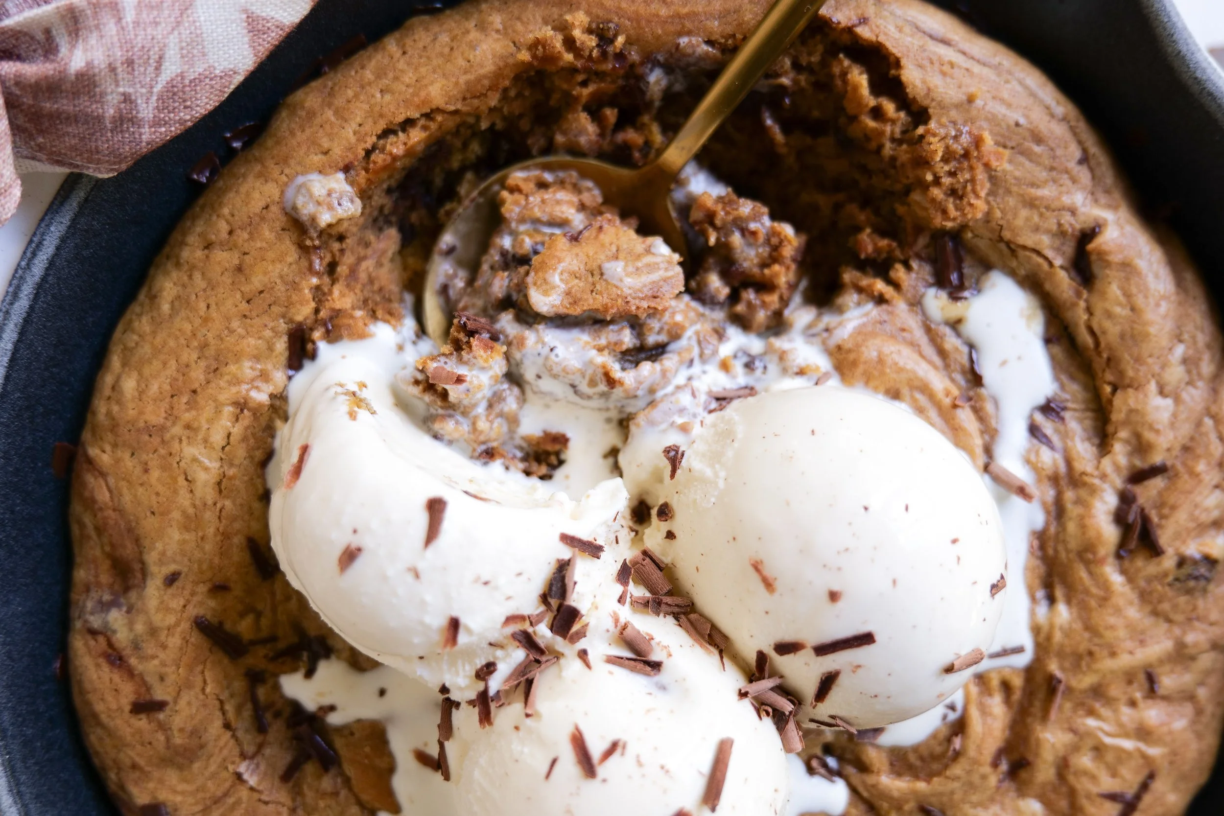Pumpkin oatmeal cookie dough mixed with chocolate chips for a skillet cookie