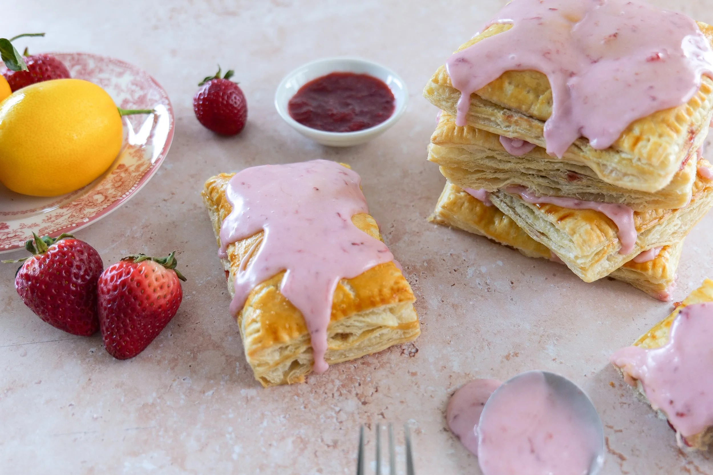 Strawberry Puff Pastry Pop Tart sliced open showing juicy filling