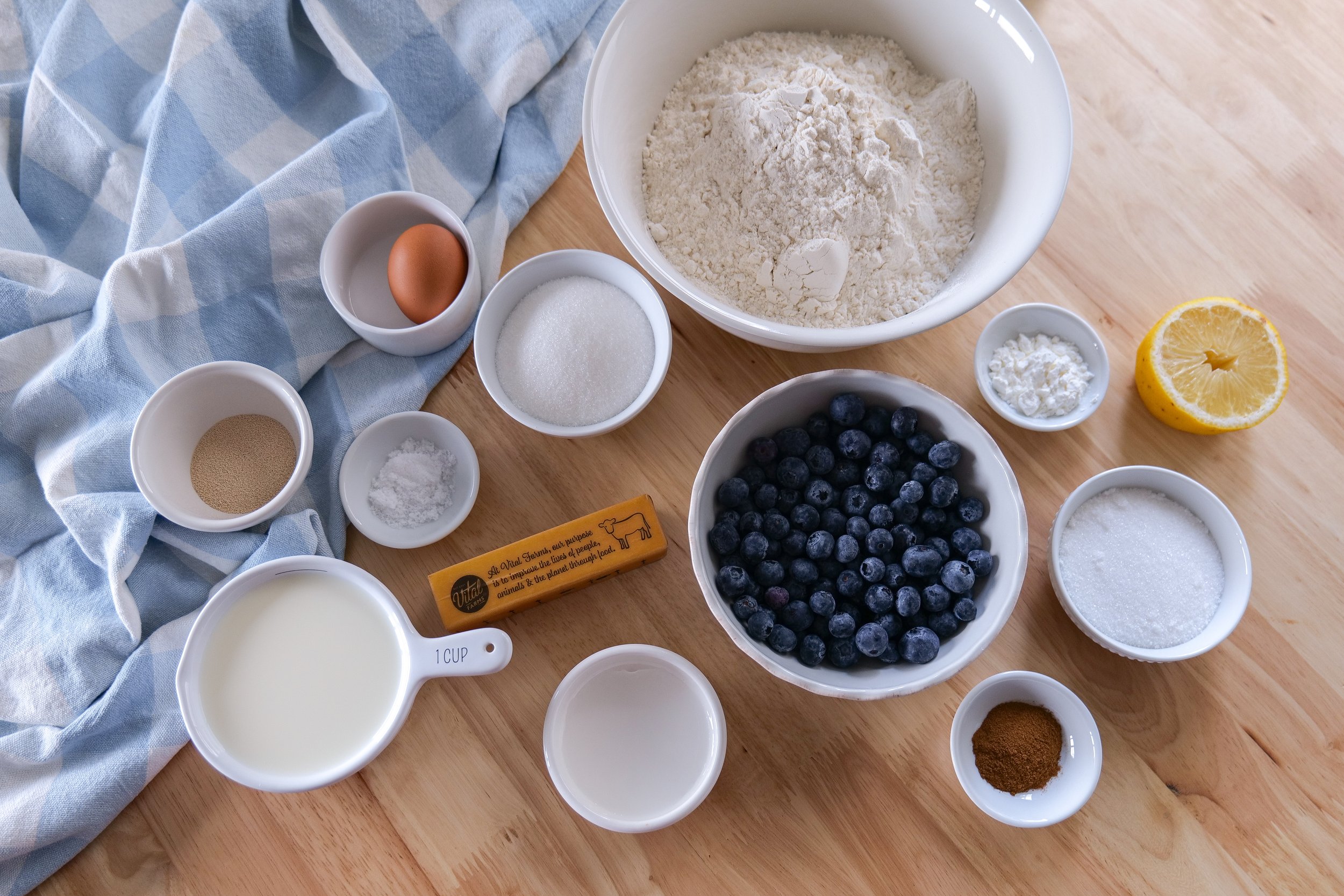 Ingredients for homemade blueberry cinnamon roll loaf with brown butter icing.
