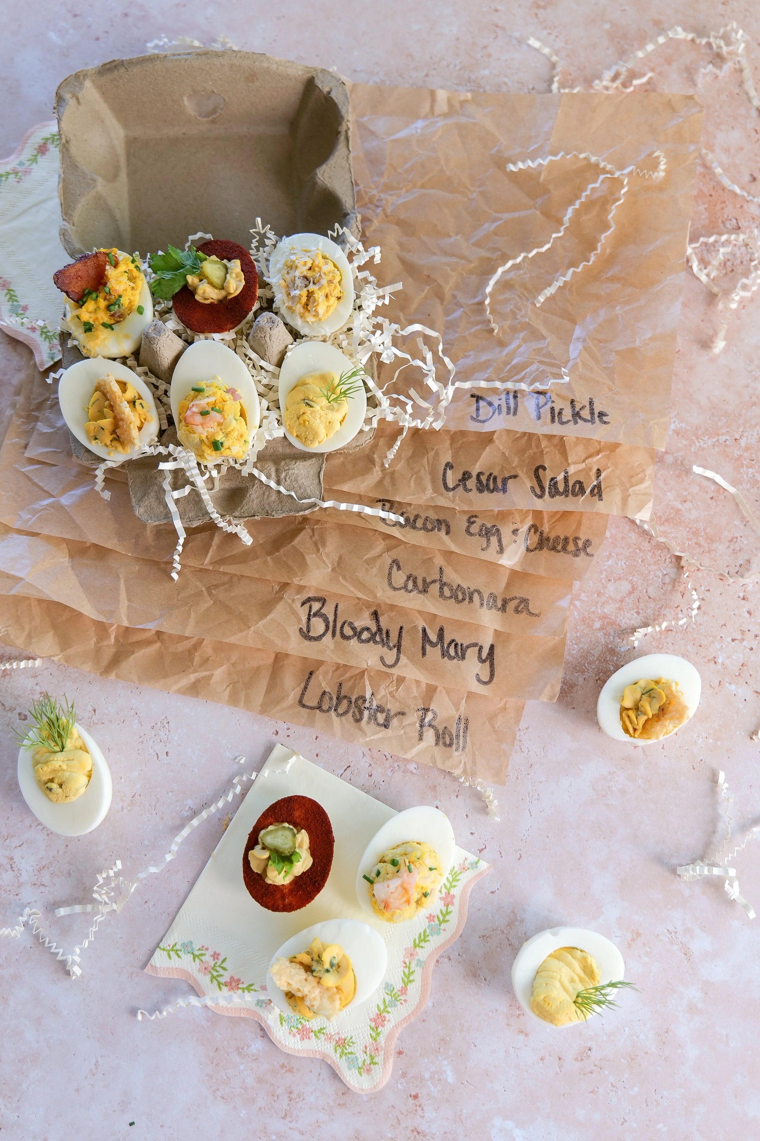 Bacon cheddar deviled eggs topped with crispy bacon and fresh chives