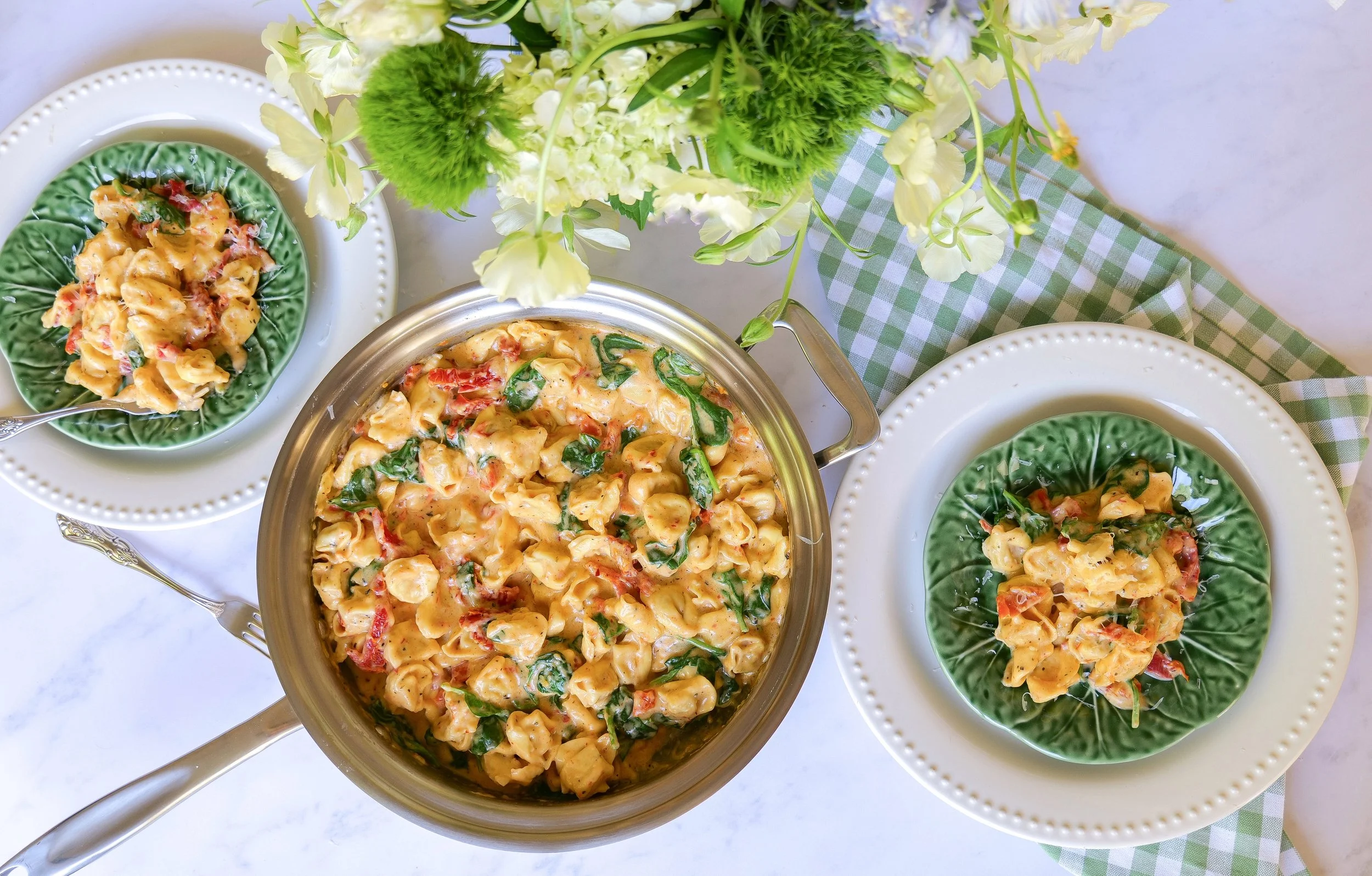 Creamy One Pot Marry Me Tortellini served family-style at the dinner table