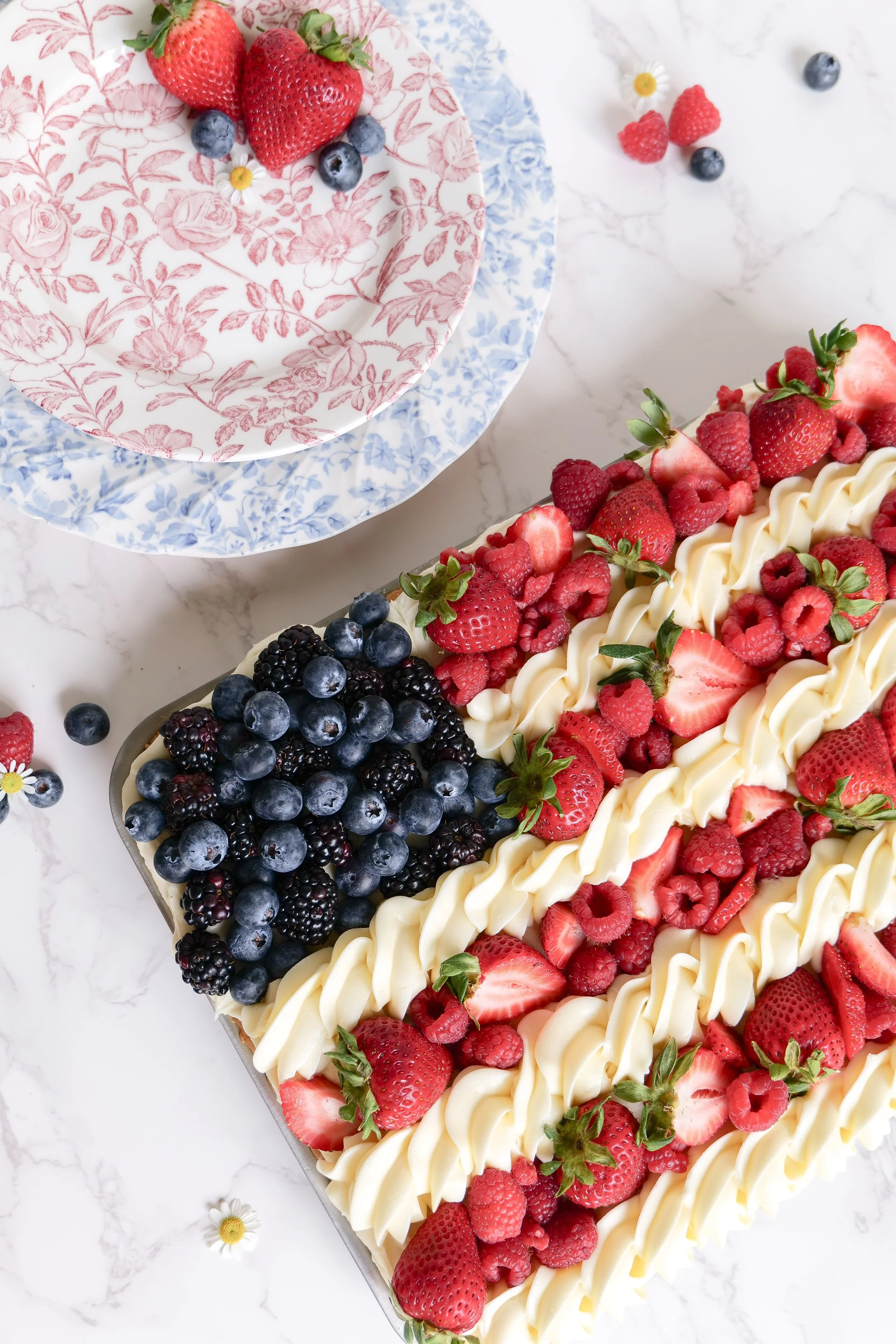 Homemade fruit pizza shaped and decorated like the American flag for 4th of July celebrations