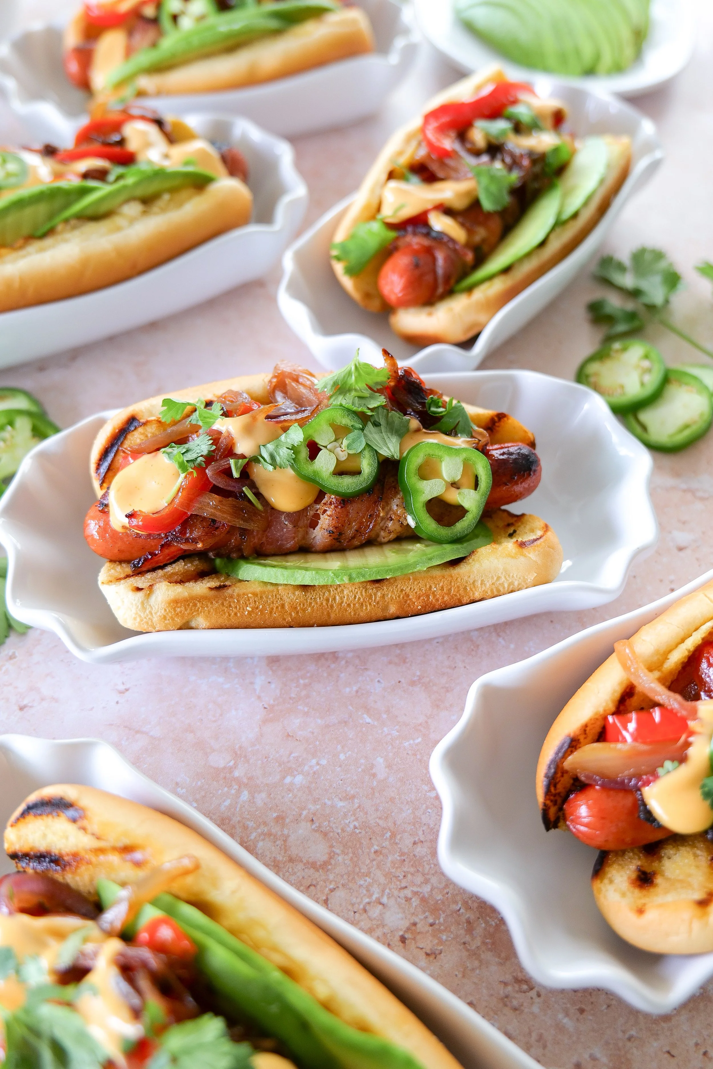 Summer hosting main course featuring bacon-wrapped hot dogs