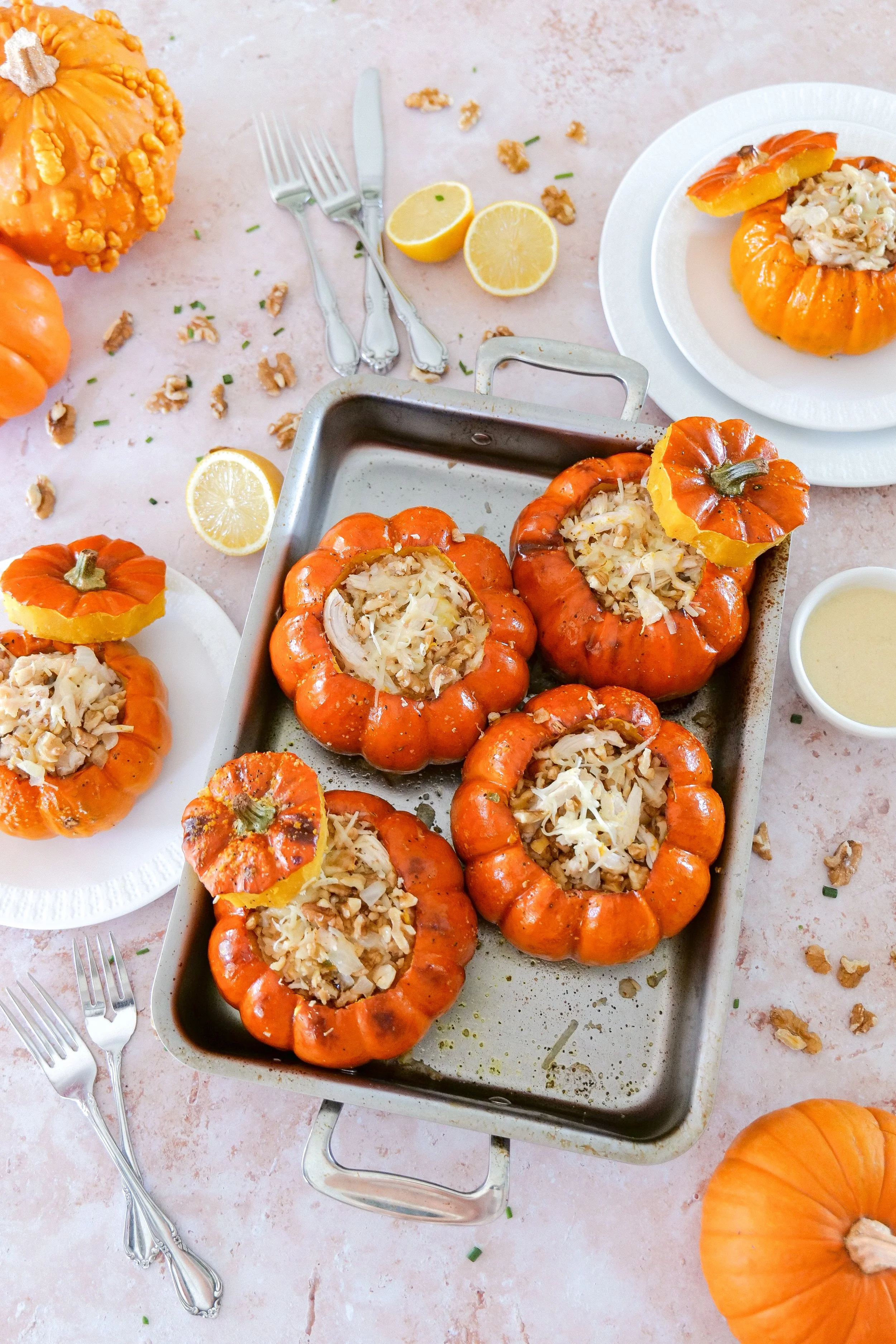 Individual stuffed mini pumpkins filled with creamy chicken for a beautiful fall dinner.