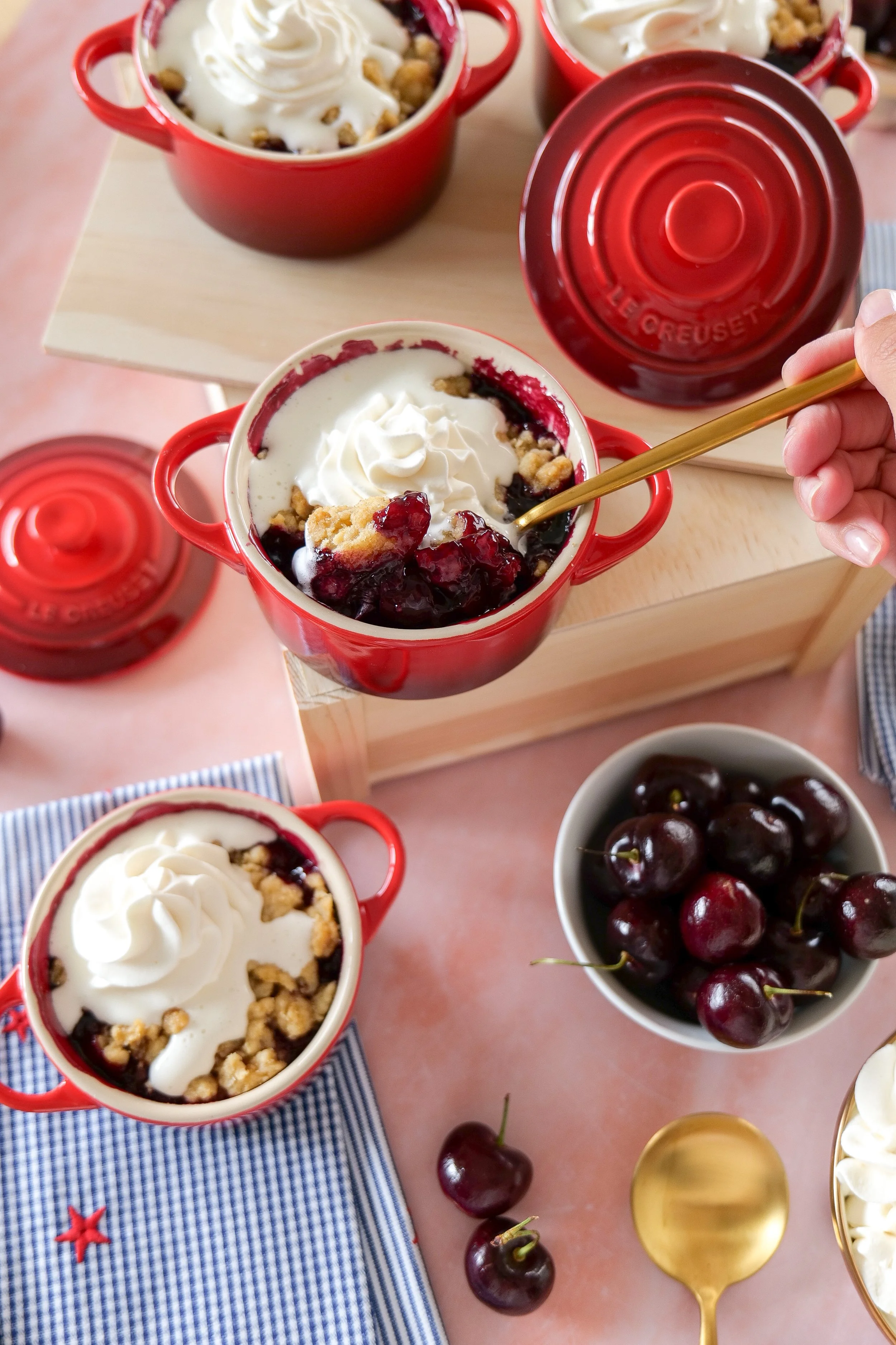 Warm cherry cobbler served with vanilla ice cream