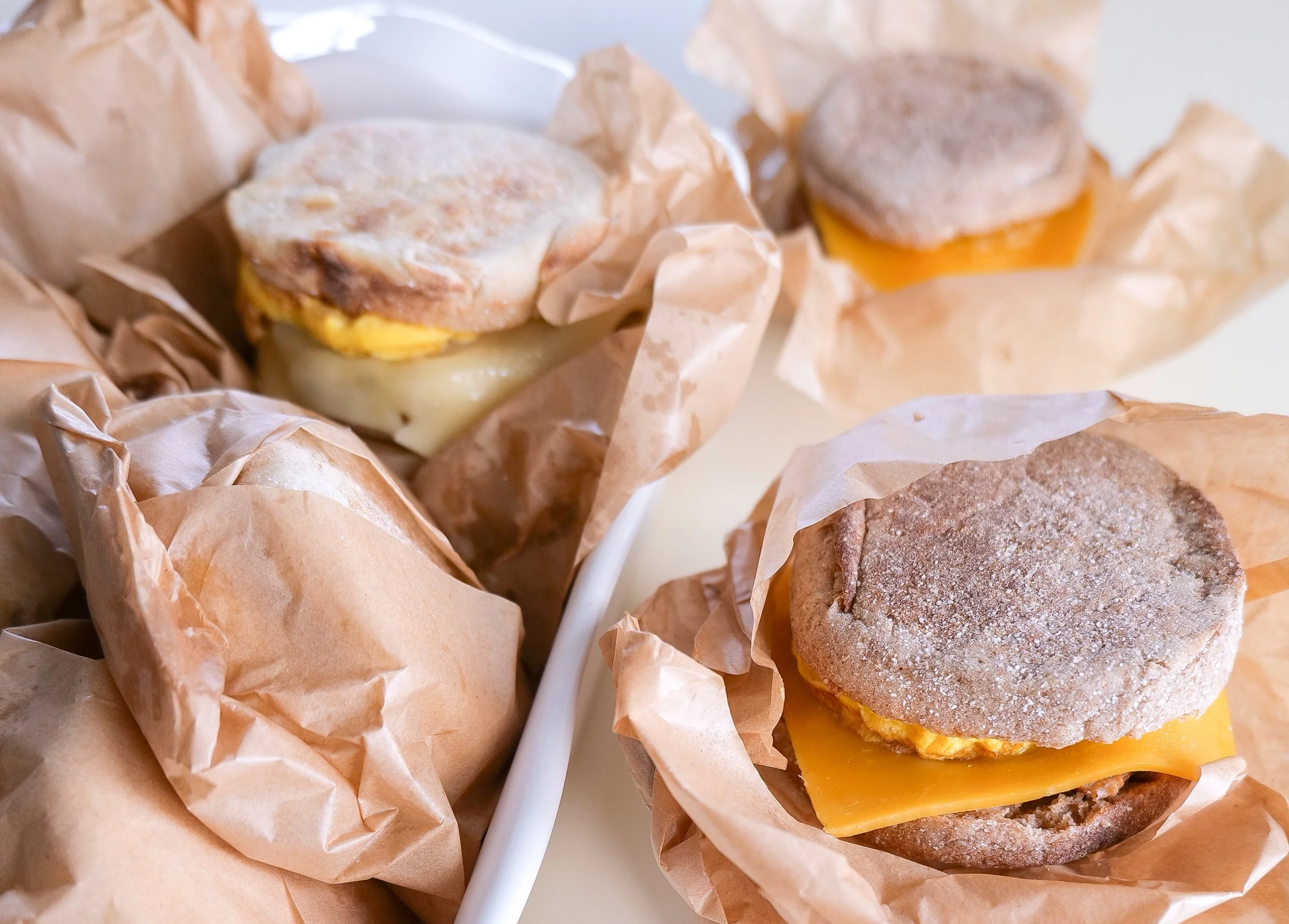 Freezer-friendly English muffin breakfast sandwich made with sausage, egg and cheese.