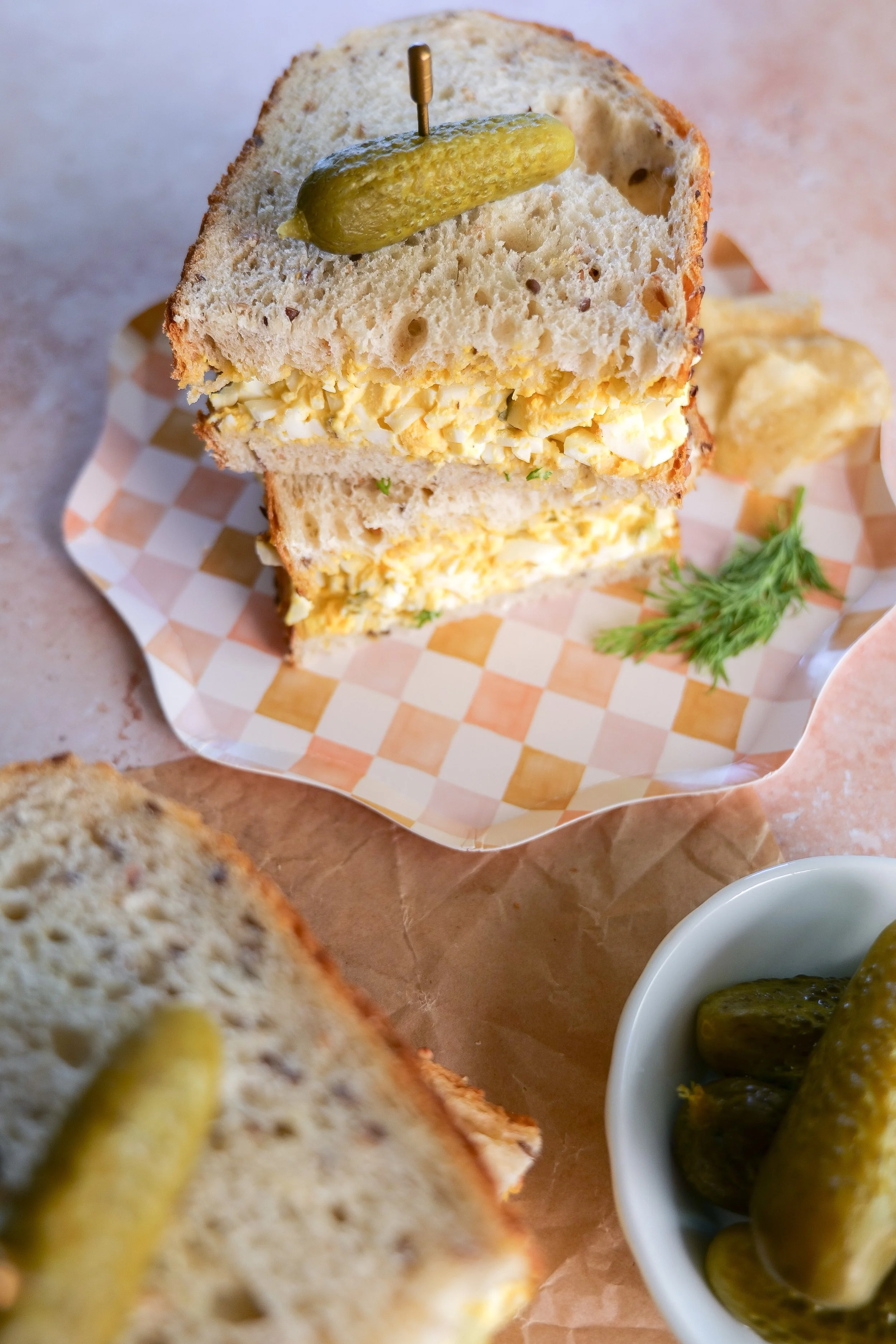 Dill pickle egg salad sandwich served as an easy make-ahead lunch.