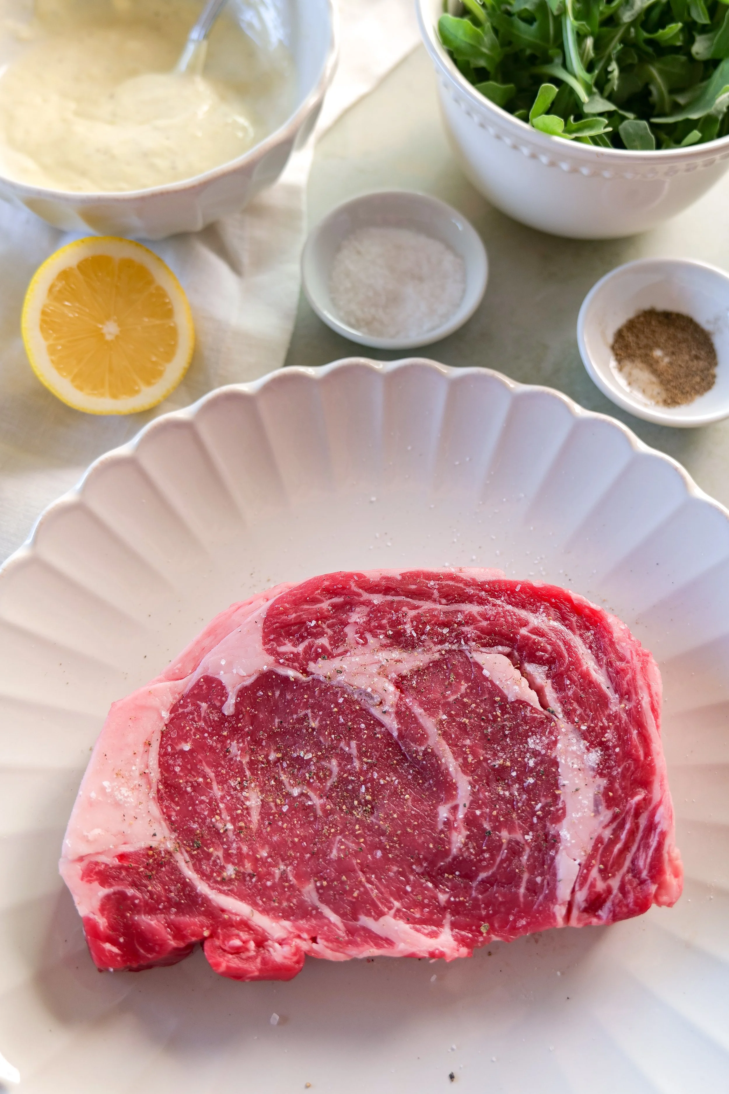 Ribeye steak seasoned