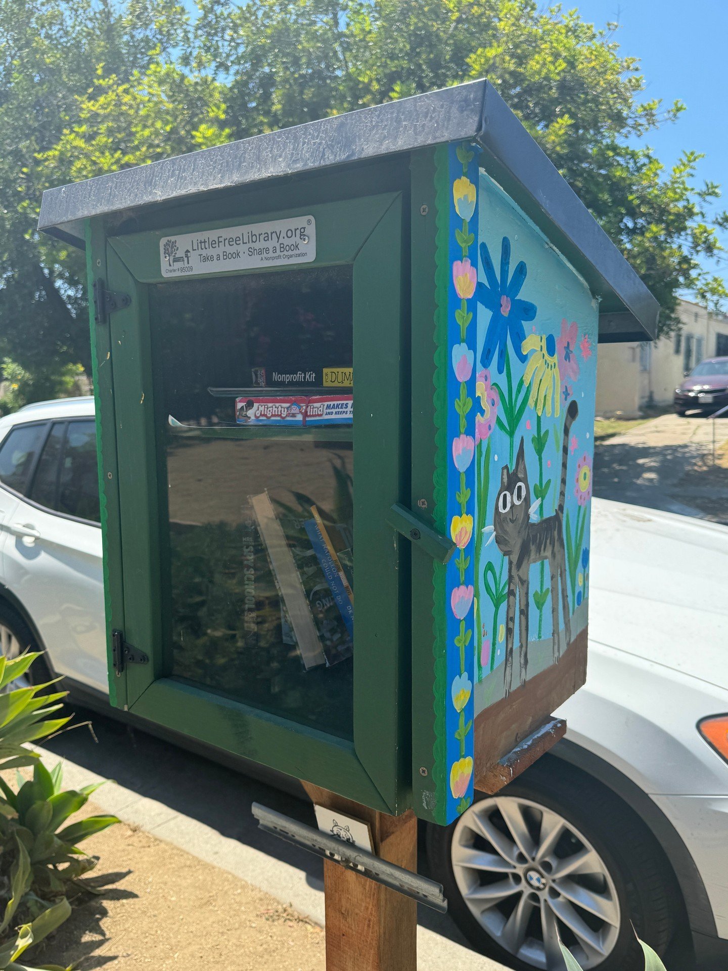 earlier in the summer, I repainted our little free library. 
in order: squeaky mama, zeus, and shadow.
📚 🐈