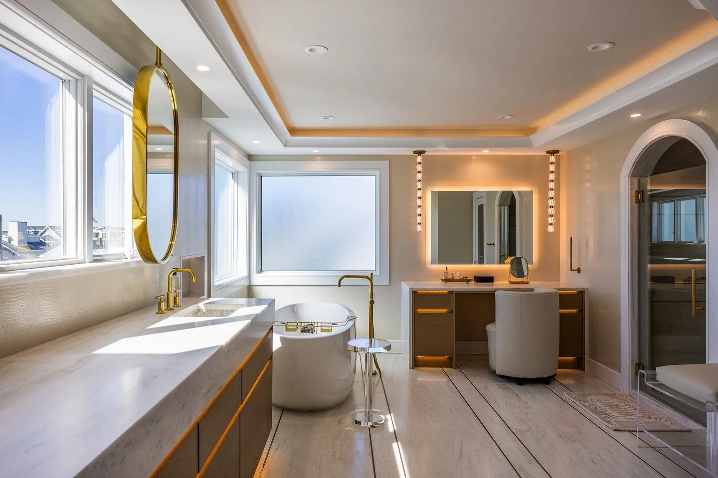 Soft textures, glowing edges, and golden hardware ✨ intentional details that transform a primary bathroom into a sanctuary 🛁🫧🛀🚿🧼
Interiors: @associateddesignstudio 
Photography: @benhalephoto 
Cabinetry: @rhale_designs @colmarkitchens 
Builder: 