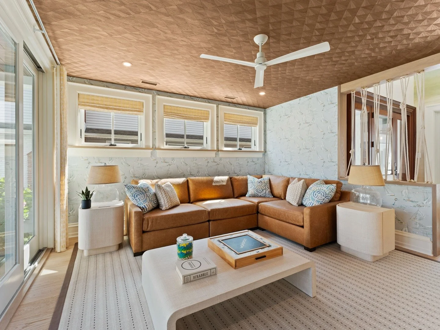 Textural ceilings, serene wallpaper, natural materials, custom rope divider, and seamless connection to the porch ✨ This space is all about curated comfort and coastal elegance 🌊🐚⛵️
Builder/developer: @georgetticonstruction 
Interiors: @associatedd