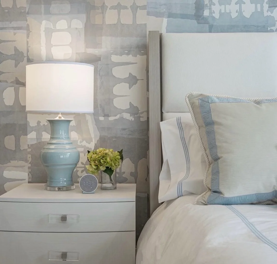 Soft textures, serene blues, and layered details that make this bedroom feel like a breath of fresh air 🌊✨ From the custom bedding to the statement wallpaper, every element was selected to create a calm and elevated retreat