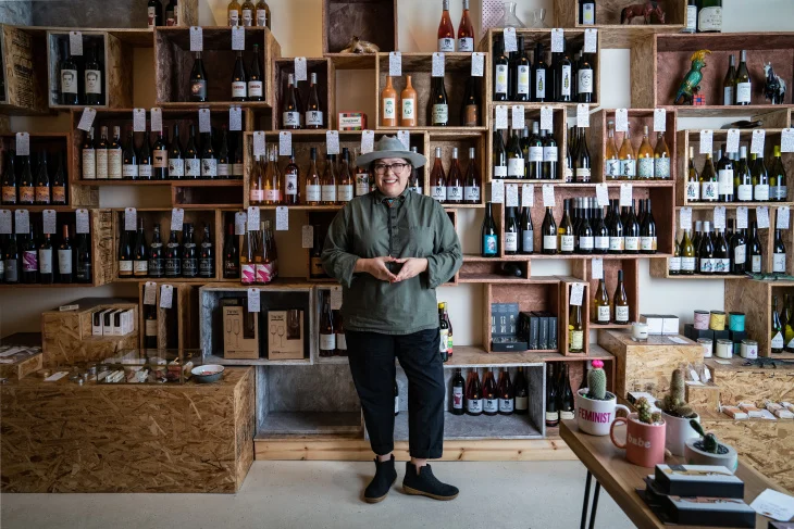 Coly Den Haan, owner of Silver Lake wine store Vinovore. (Jon Endow for LAist)