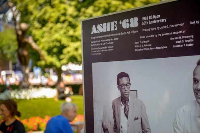 The Ashe ‘68 Phpto Exhibit, 16 panels, displayed on The Alley, the main walkway at the US Open. In the background, left, the iconic Arthur Ashe statue.
