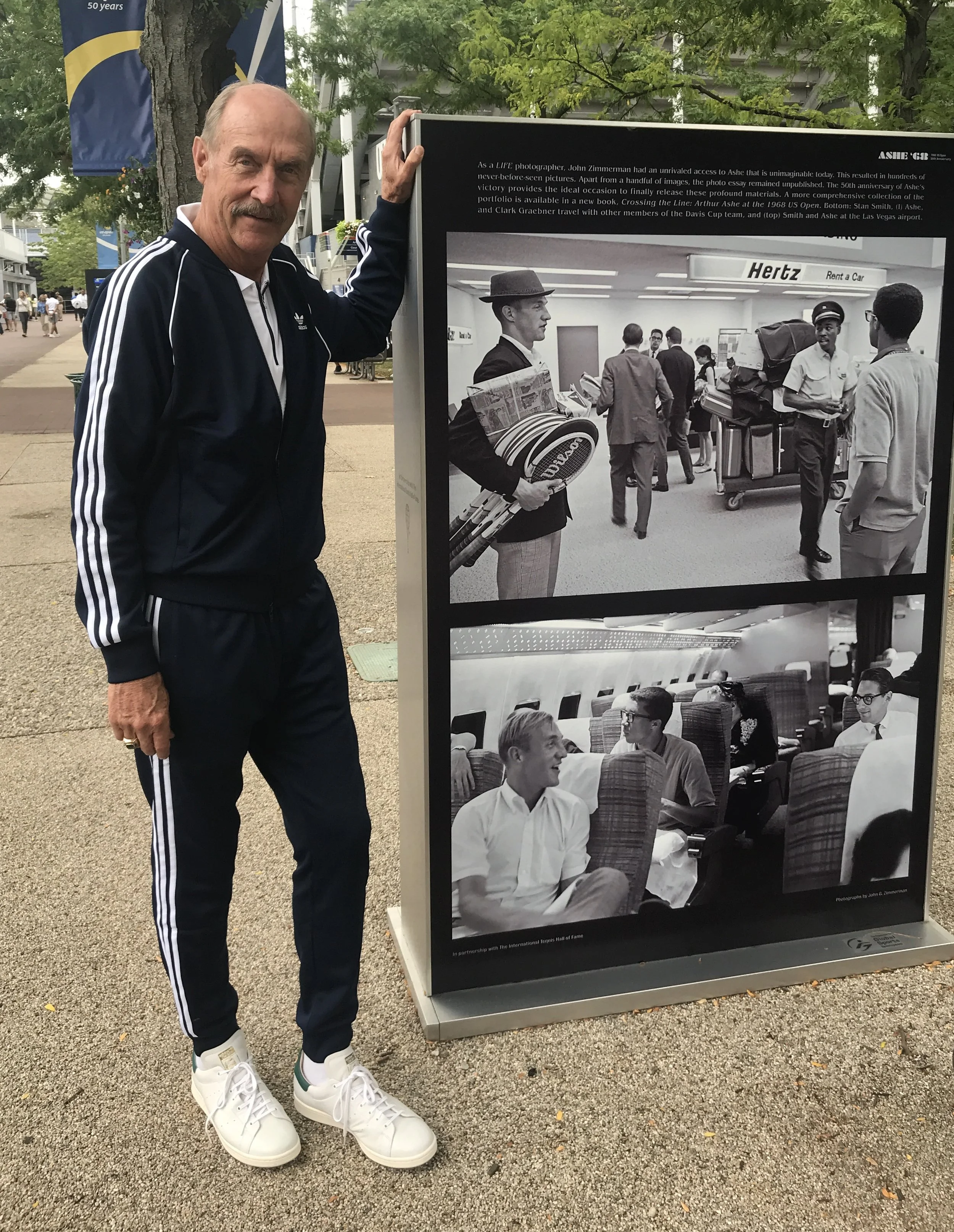 Stan Smith, in 1968 with great friend Arthur Ashe, and now. Stan is a former world No. 1 American tennis player, US Open (‘71) and Wimbledon (‘72) singles champion who also, with his partner Bob Lutz, formed one of the most successful doubles teams of all time. But, as his beautiful new book (by Rizzoli) points out on the cover, “Some people think I’m a shoe.”