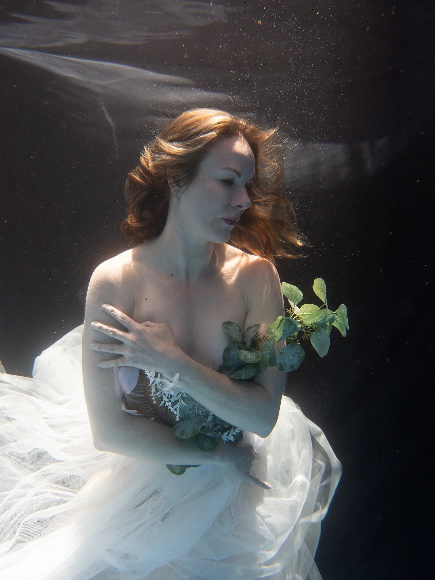 Her hair fell in soft, flowing waves, catching the light with a quiet glow.  Petals traced her shoulders, and delicate tulle wrapped gently around her. 
This was her world&mdash;untouched by anything, existing only for her. 
.
.
The beautiful @shanyn