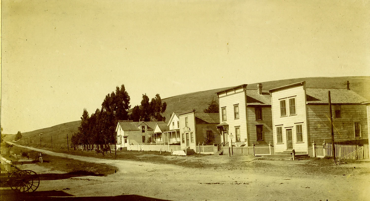 This early 1880s view of six houses on the east side of Tomales’s Maine Street (Highway One) is completely recognizable today, and illustrates how an enduring environment can encourage a sense of the continuity of life.