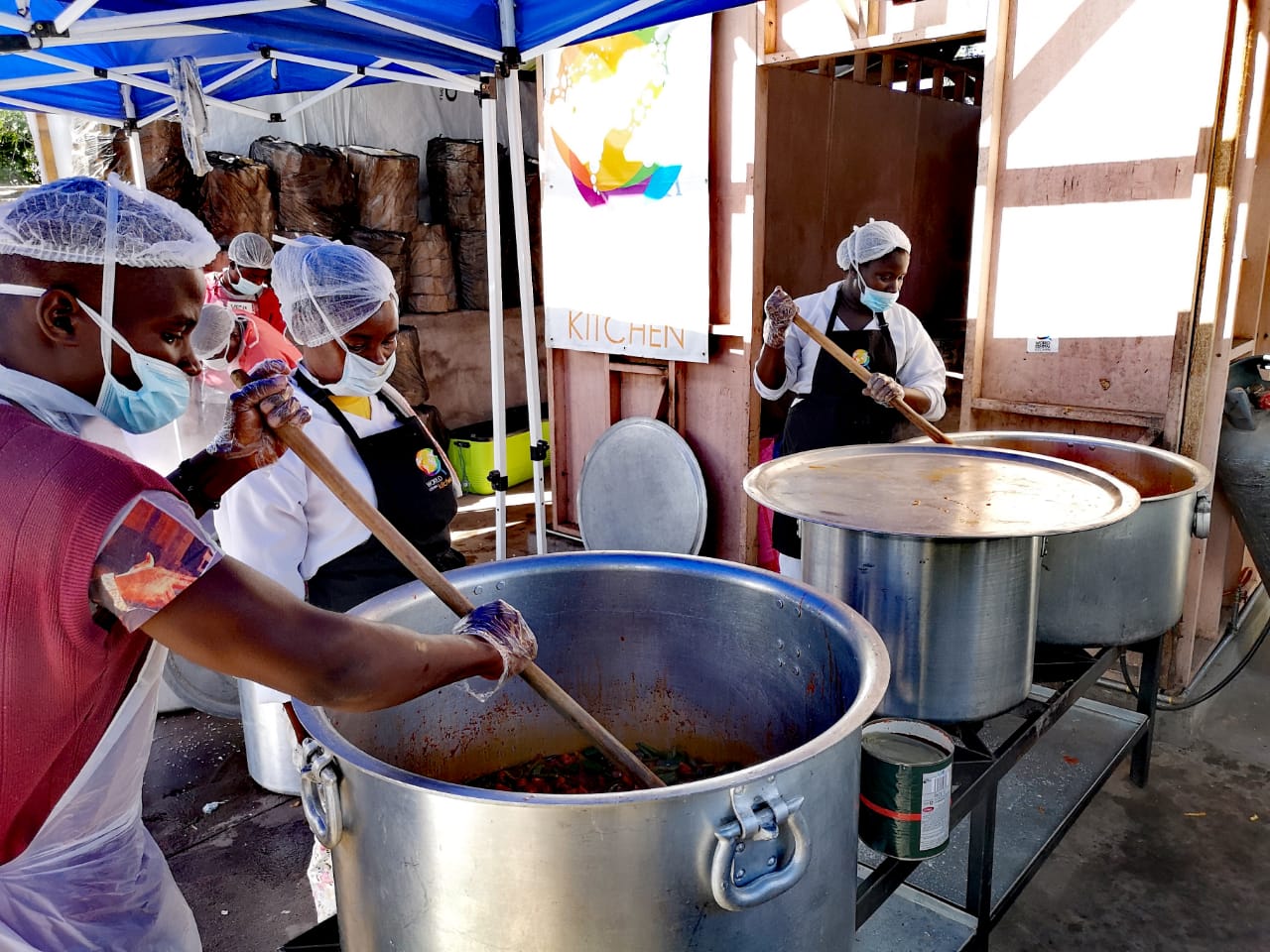 WCK’s local team preparing meals for 2000 kids at the kitchen we built in Mezimbite.