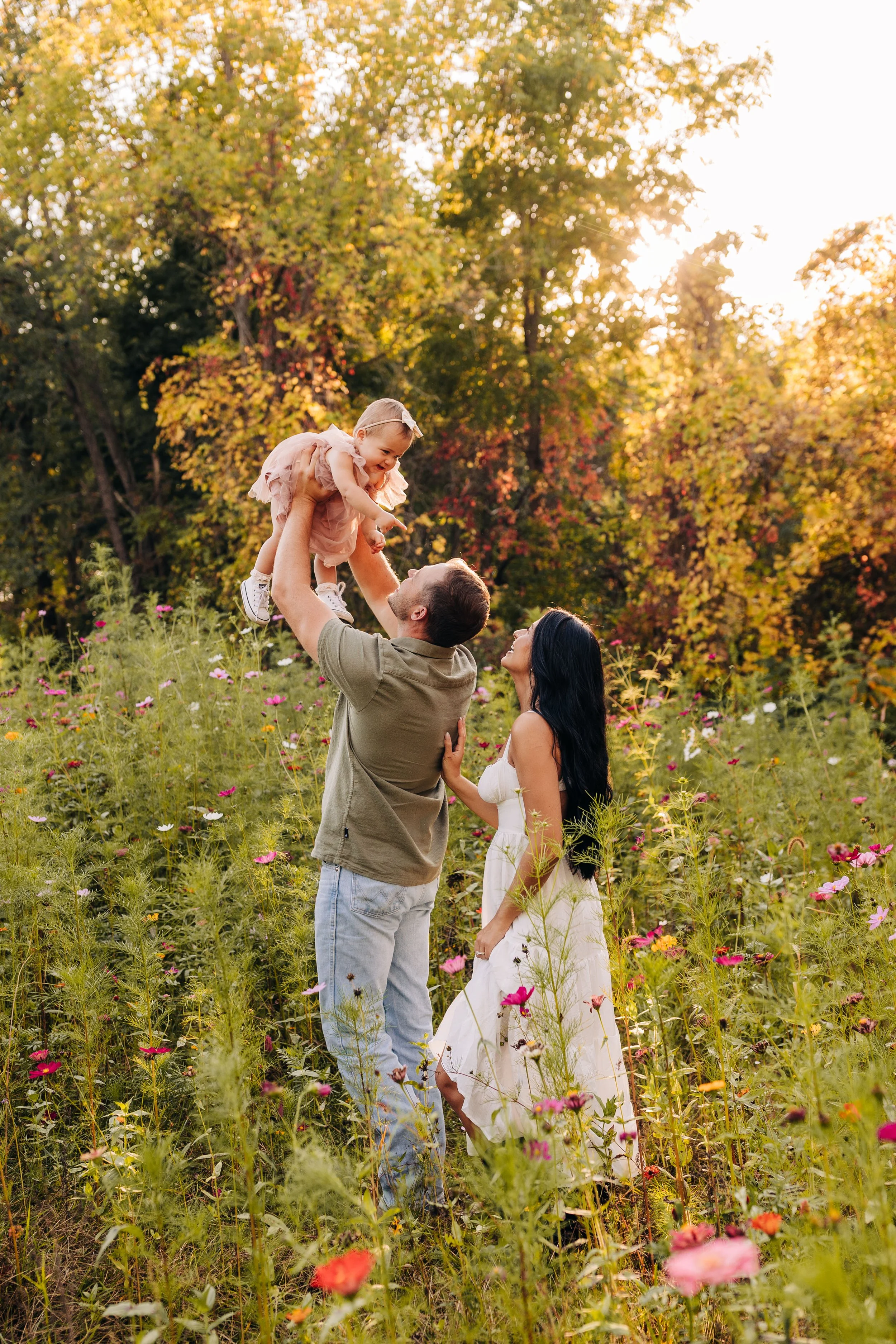 Family photo in a flower field near Grand Rapids Michigan