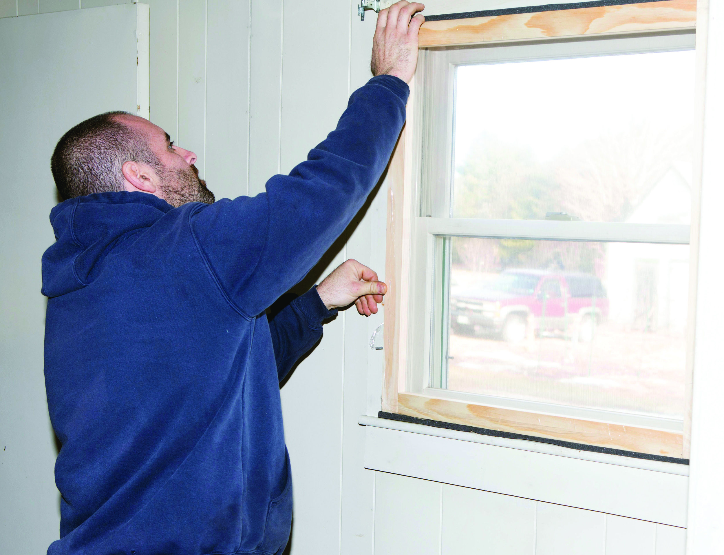 Some Habitat for Humanity affiliates in Maine are also helping to reduce the cost of home ownership by providing free home weatherization services for low income homeowners. Using volunteer labor and donated materials to built storm windows and add insulation around drafty windows and doors, these programs help homeowners to reduce their utility costs by improving the energy efficiency of their homes. (Photo courtesy of Habitat for Humanity of York County)