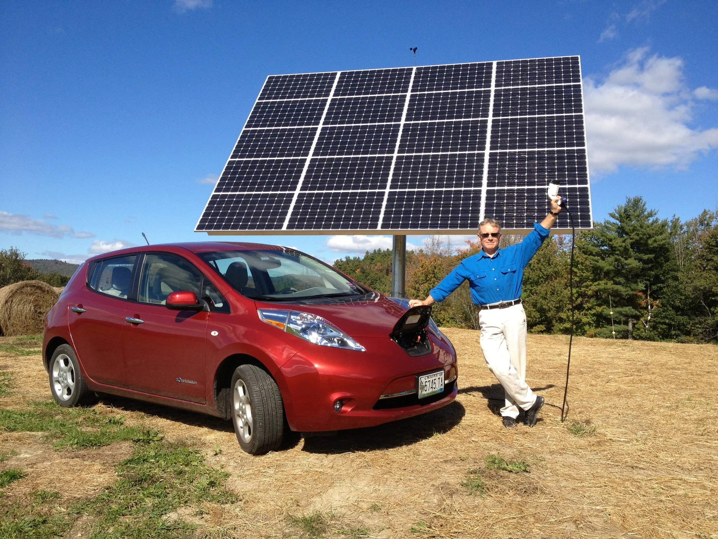 Fred Garbo of Norway, ME with the solar tracker that he uses to generate electricity for both his home and all-electric Nissan LEAF.