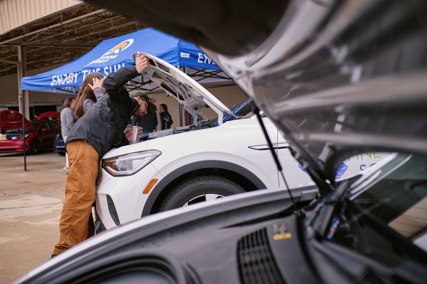  Tour the cars at the Electric Vehicle Expo at the show. 