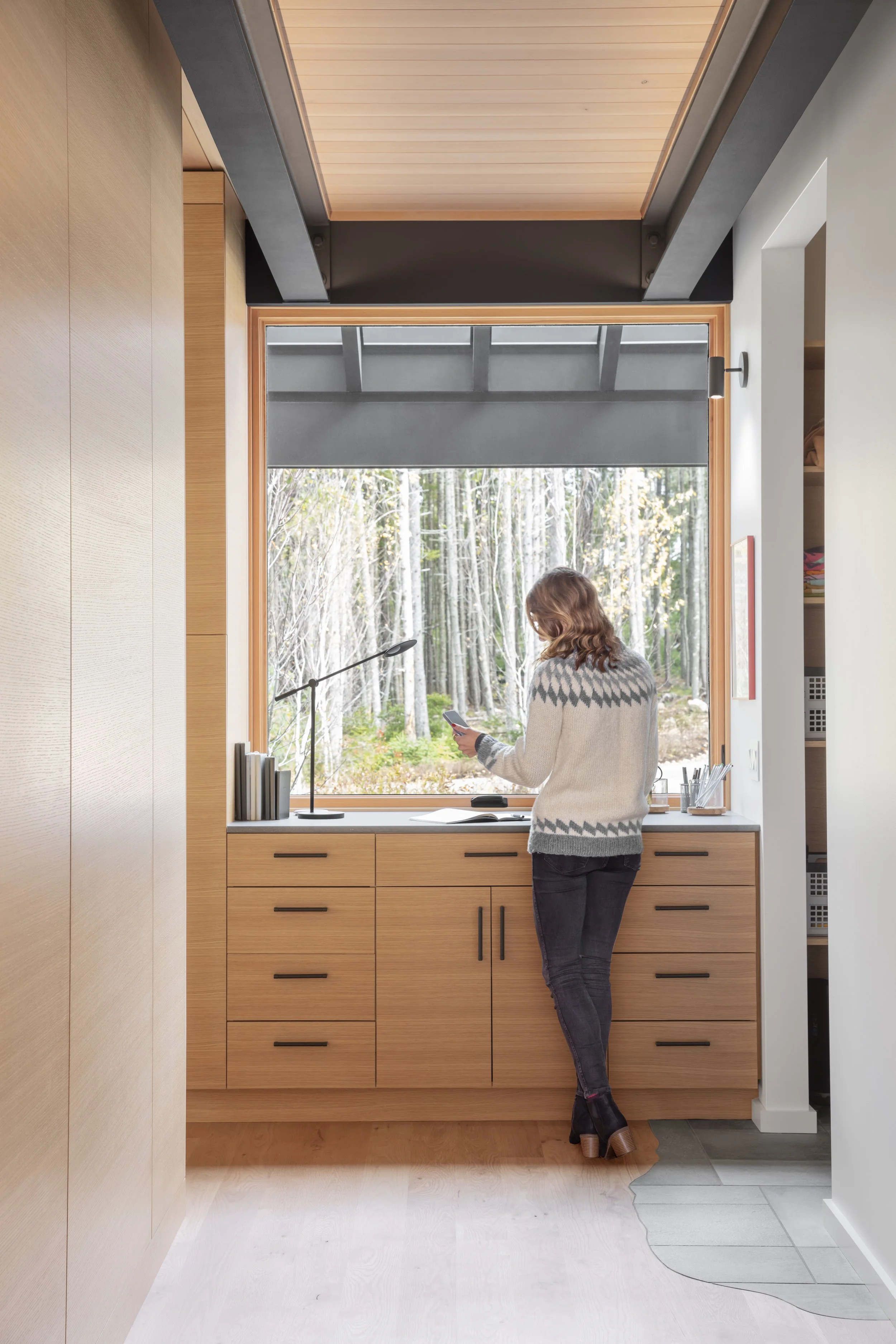  A compact workspace overlooking the back garden and trees beyond. 