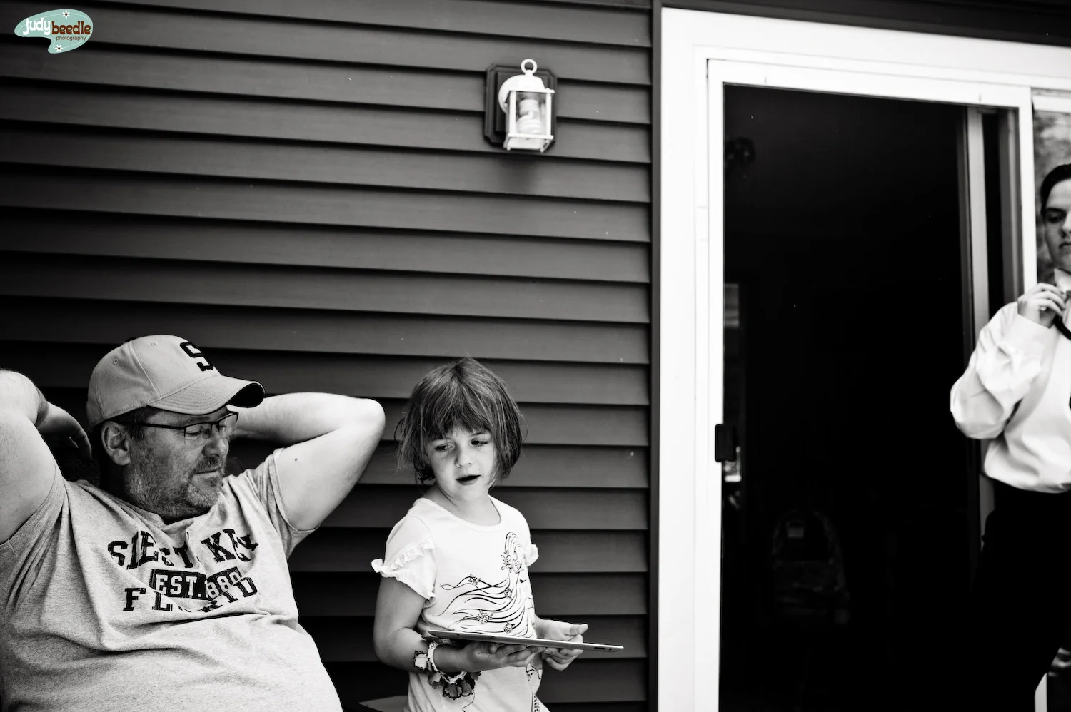 6/9. Hanging on my brother’s back deck and the Neph needs help with his tie.