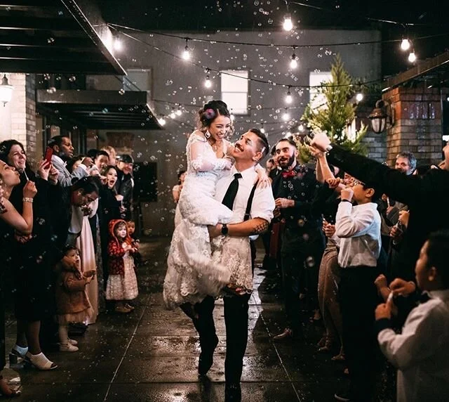 Okay how adorable is this bubble exit? Alysha &amp; Victor are so dang adorable and this photo just makes me smile because this represents how the entire day was. Full of love and laughter! Also, if you&rsquo;re considering a grand exit for your rece