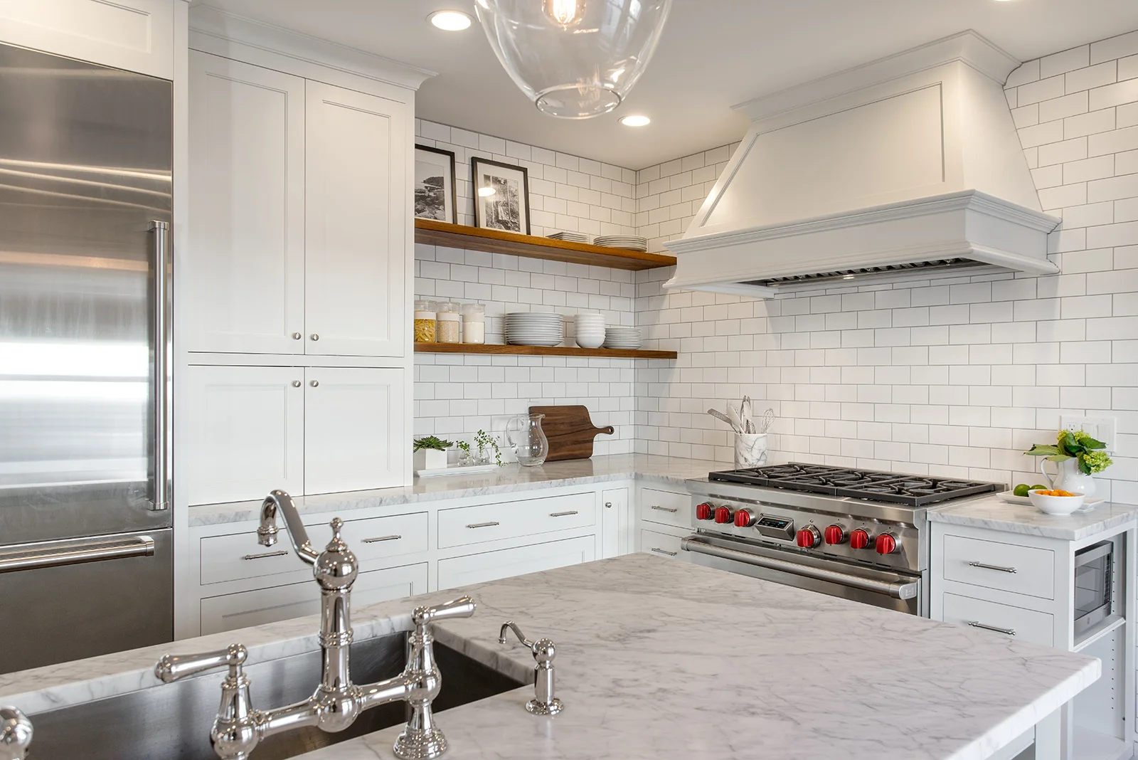 from pantry cabinet toward range and fridge.jpg