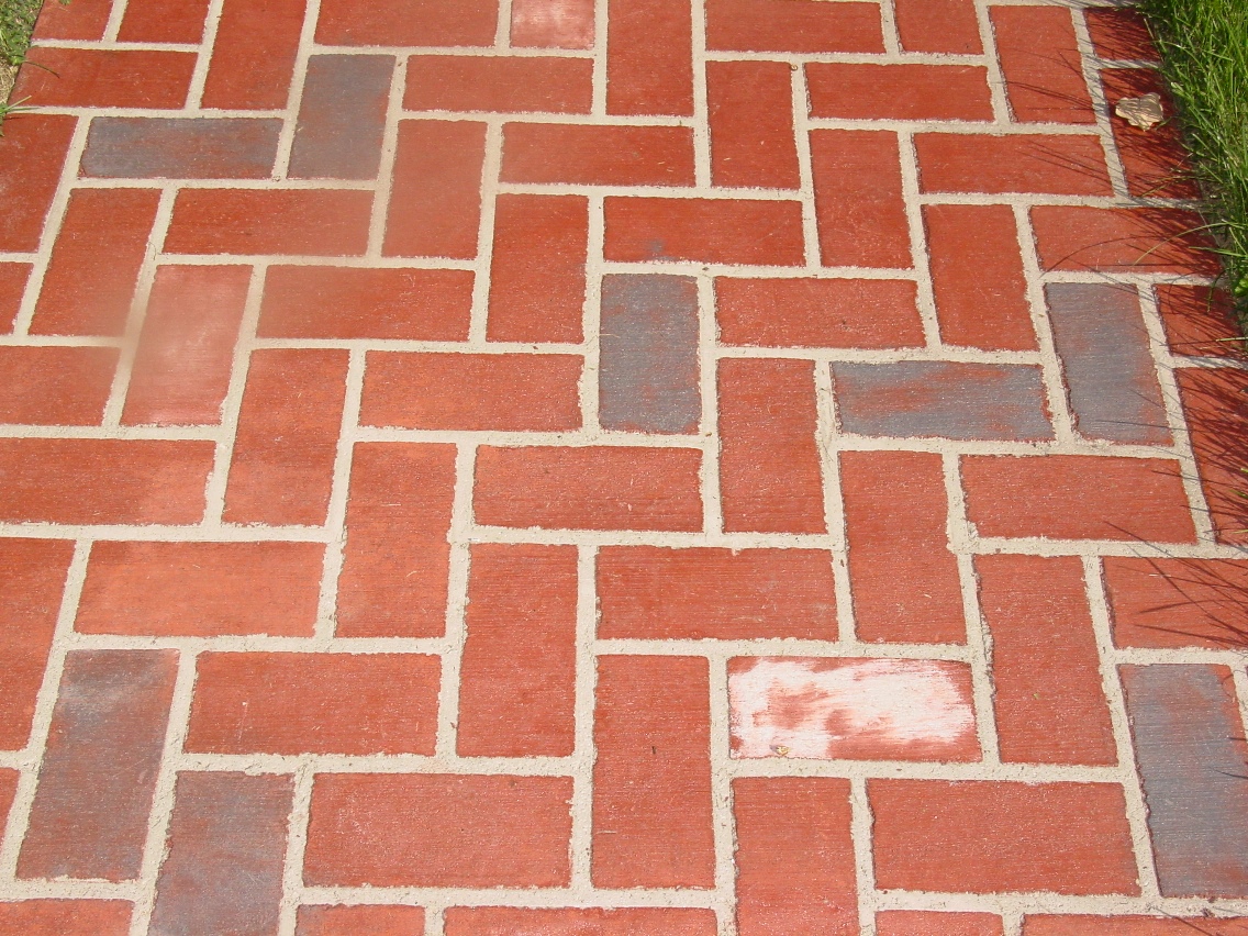 Herringbone Stenciled Concrete with brick red color, Charcoal Gray Release with Plantinum and Natural white splahes 1.jpg