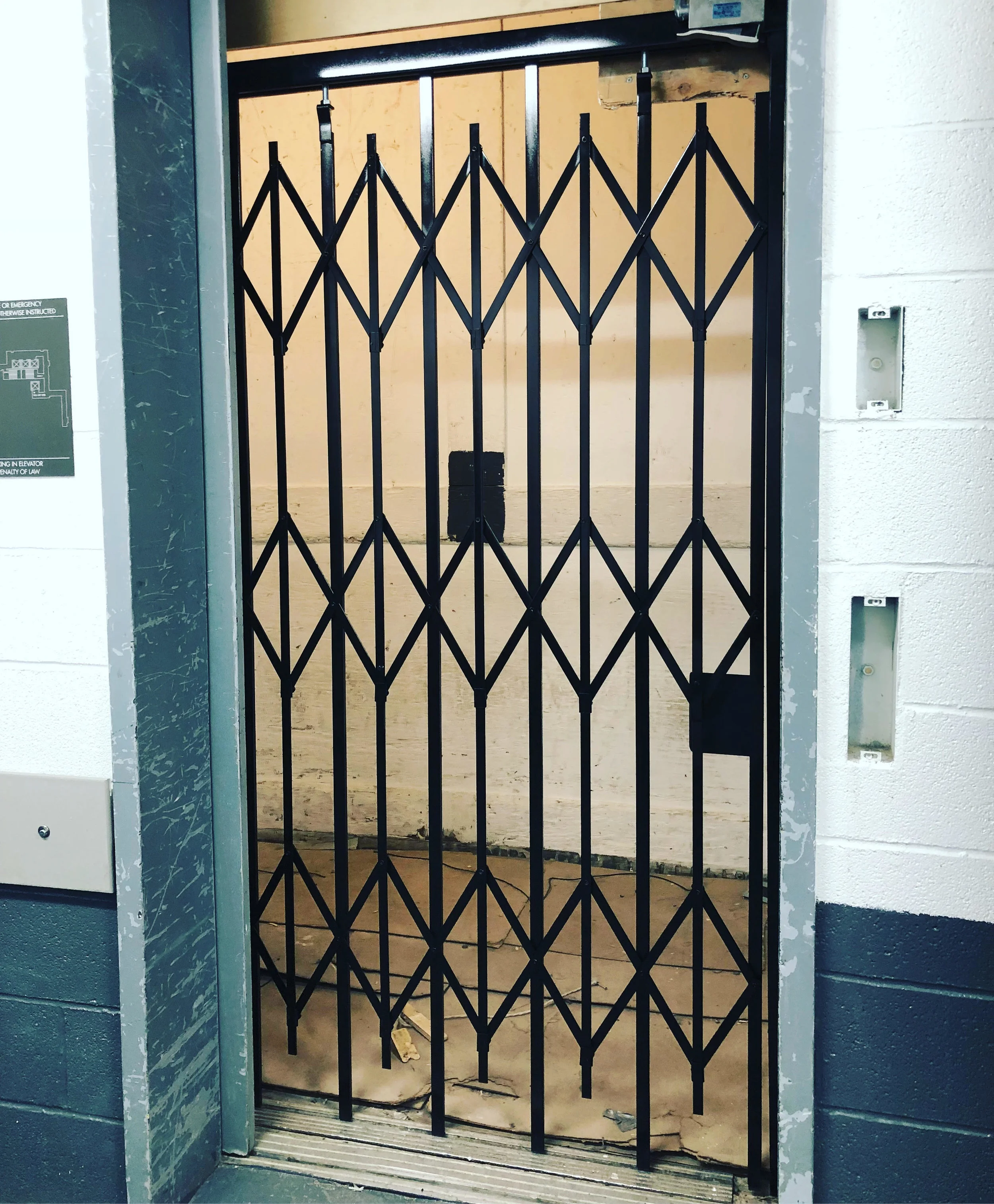 accordion gate door