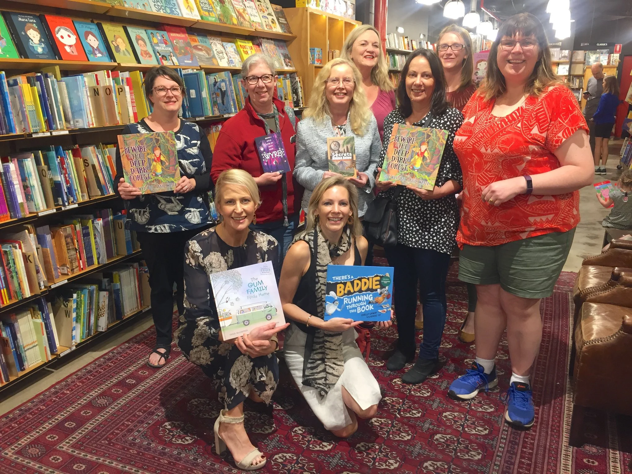 A bunch of amazing authors celebrating the launch of Sue Whiting’s latest PB, all holding their own recent releases.