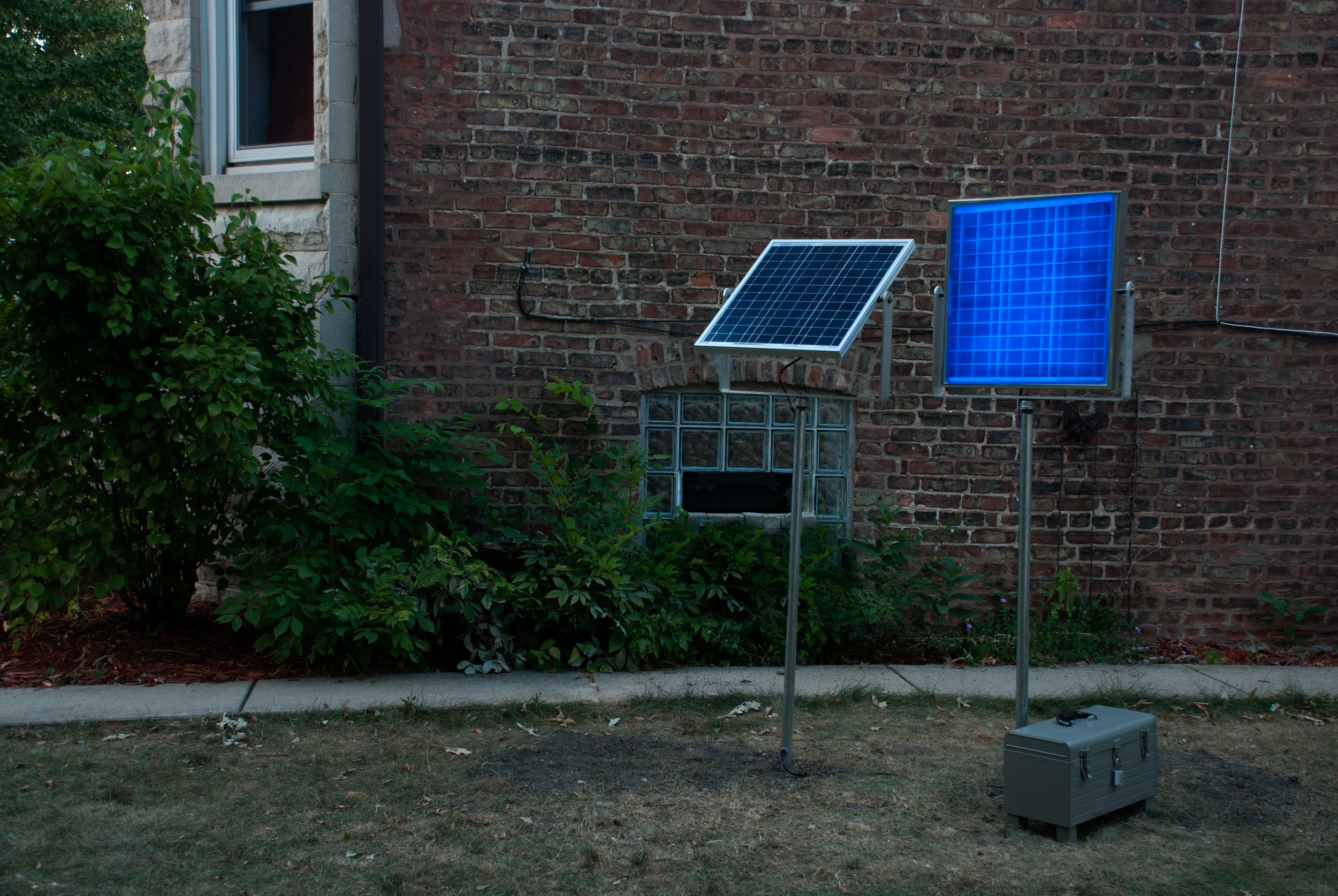   Night See . Solar panel stores light to power replica that lights at dusk. Each is 36” x 72” . Terrain Biennial. Terrain Projects, Oak Park, IL. 2013 