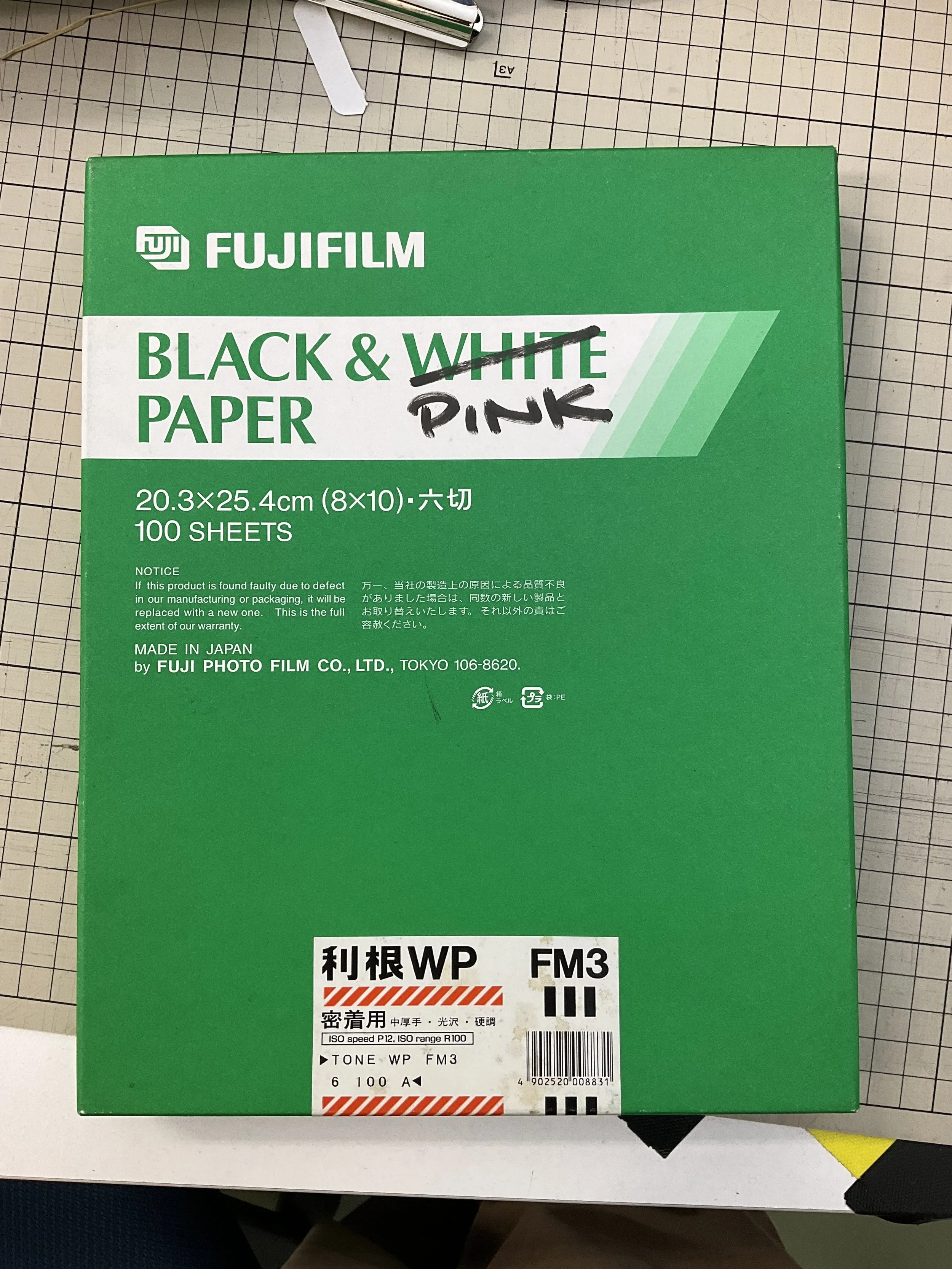 Black and 'pink' paper