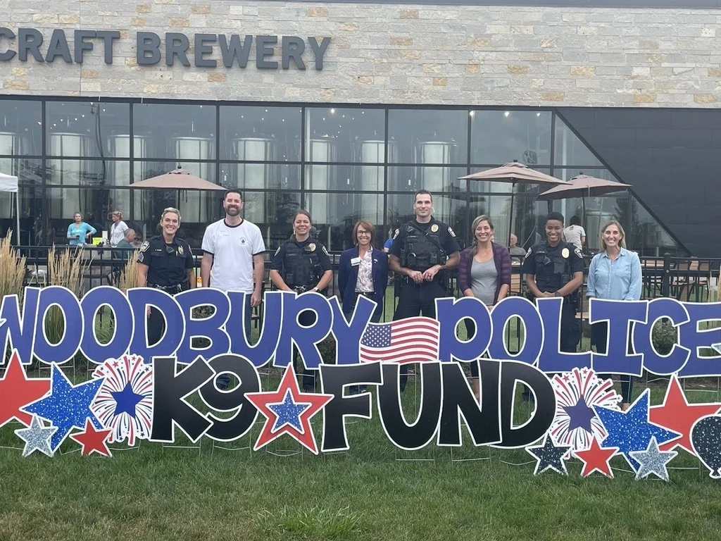 WoodburyK9Fund picture outside 3rd Act Craft Brewery