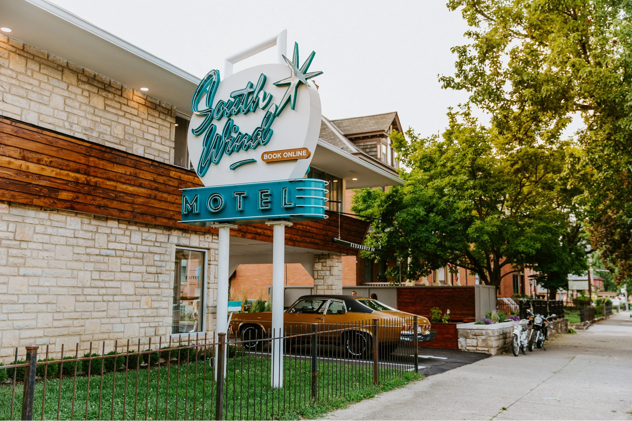  The script logo and sign were designed by Flat Black Commercial Visuals.  Double Knot Home  thoughtfully reimagined the motel, preserving its original character with proper midcentury vibes to match the building’s history. 