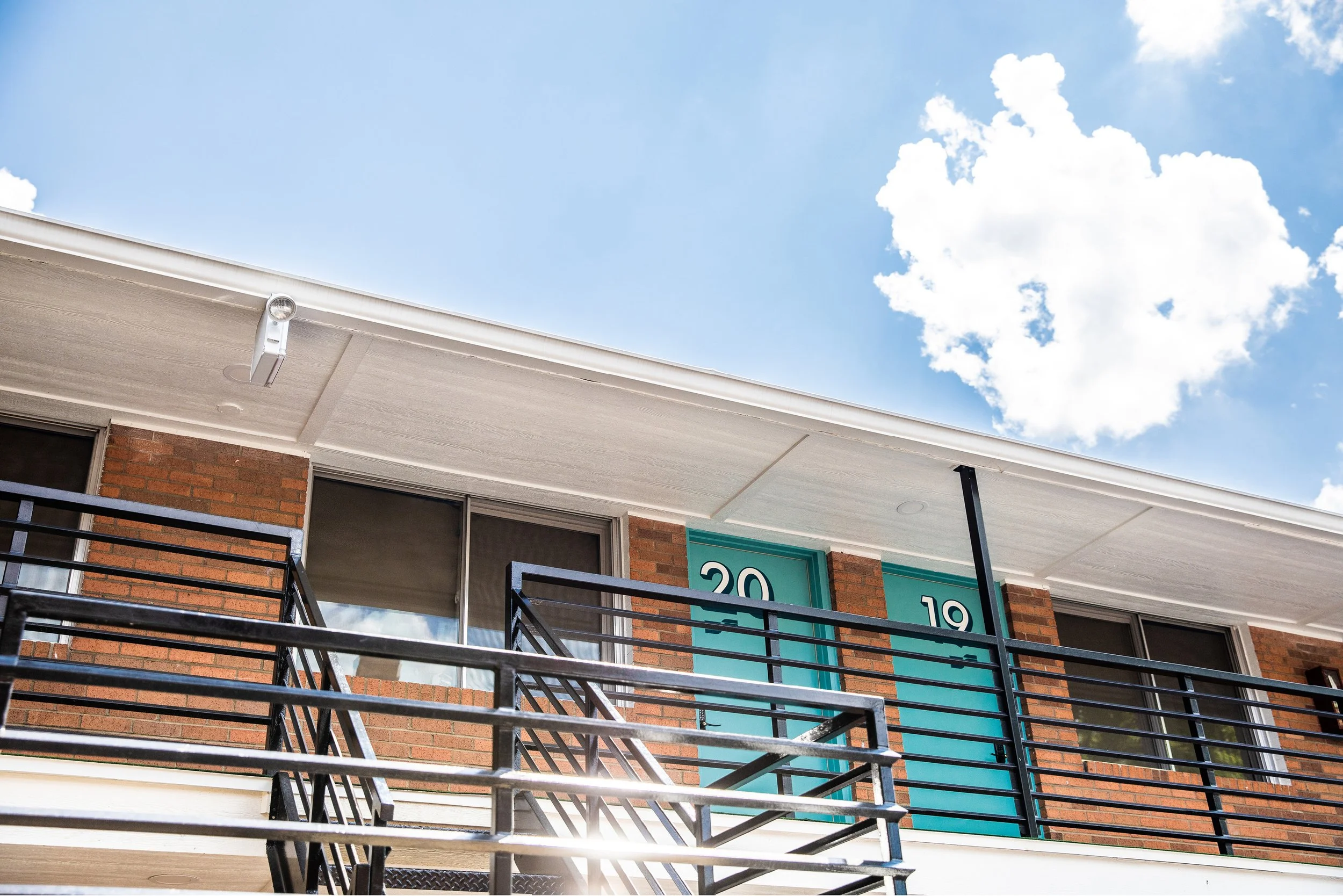  Knowing that visitors will often arrive after hours, we made the room numbers bold and graphic so that they would be easily identified late at night. 
