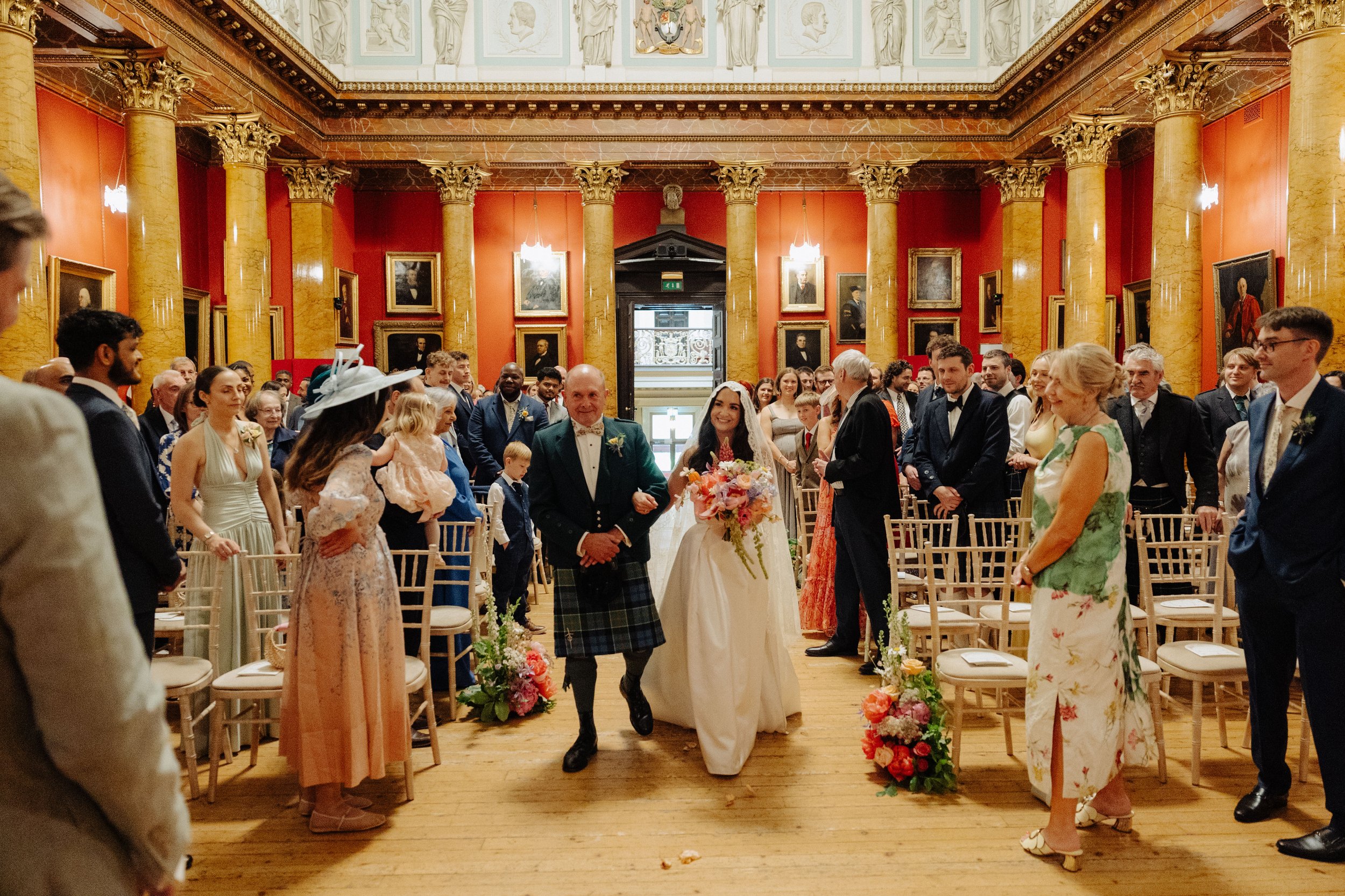 father walking daughter down the aisle in Royal college of physicians