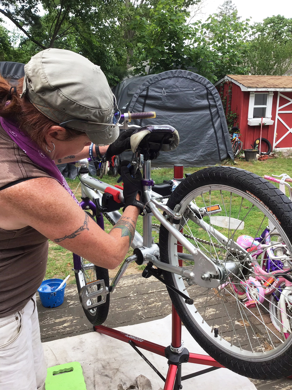Lisa working on bike2 good.jpg