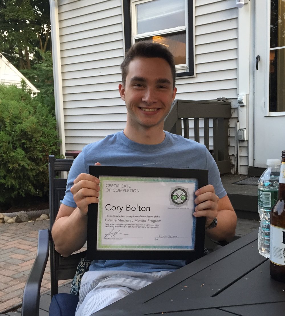 cory holding certificate.jpeg