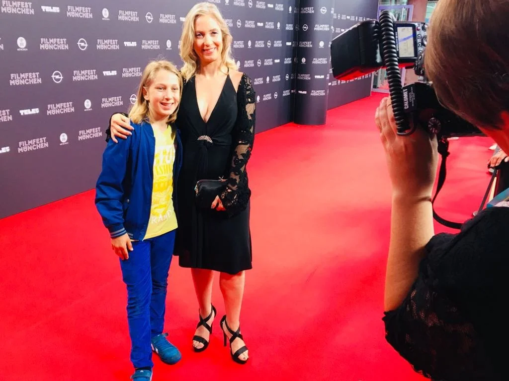 child actor on red carpet with talent agent