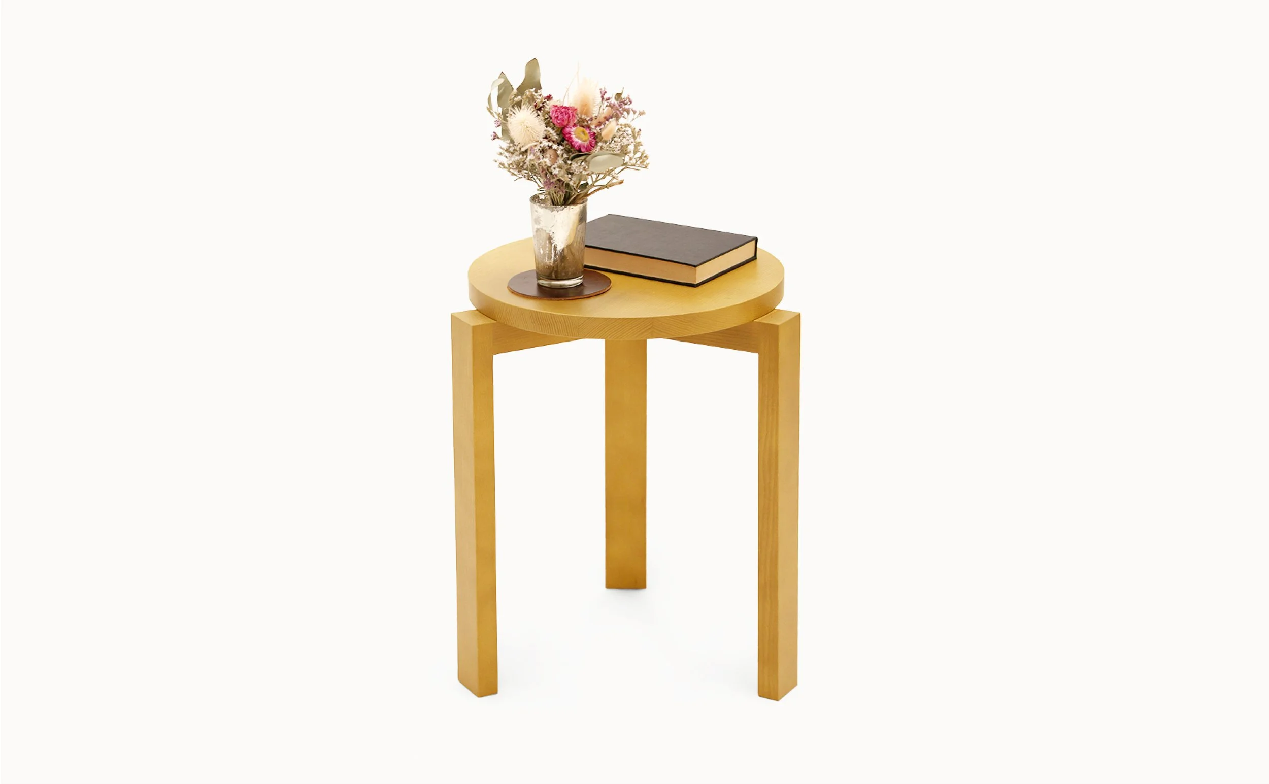 The Burrow Index Stool is a flat packed flexible seating and side table solution made entirely from solid ash wood. It can act as an extra seat, side table, plant pedestal, night stand, and footstool to help when reaching for things on the top shelf