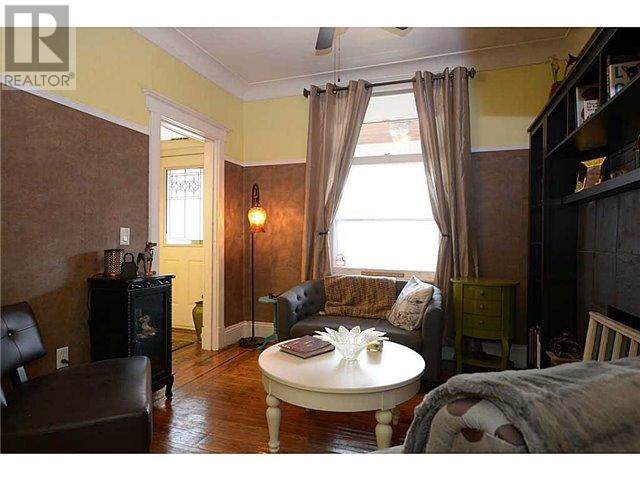 Our front room. As staged for sale. We’re currently using it as a dining room. It is very brown.